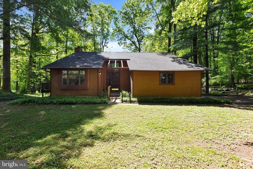 Beautiful contemporary/ split level in Sagamore II. Wooded 1.32-acre in a park like setting. Efficiently designed 4 bed 2.5 baths with attached 2 car garage in just under 2,000 finished sq feet. HOA is self managed with very nominal voluntary dues. This one won't last!