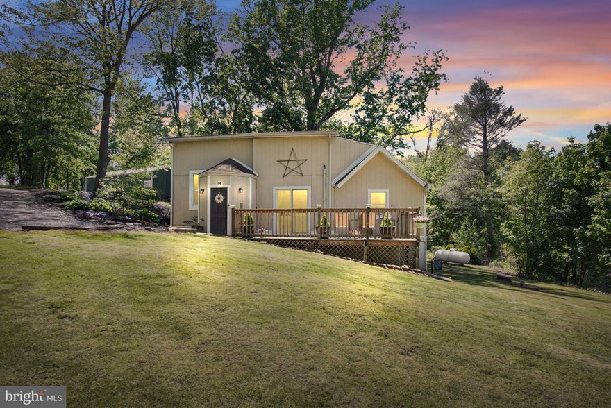 Charming ranch home offering 3 bedrooms and 1 full bath, set on a private lot at the end of a quiet lane. This property provides a true sense of privacy and peaceful surroundings. The home features vaulted ceilings in both the kitchen and dining area, creating an open, airy feel. Enjoy outdoor living with a wooden deck and a screened-in porch which is perfect for relaxing or entertaining. Additional highlights include a pole barn, garden shed, and a detached building with heat & electricity, offering flexible options for storage, hobbies, or a workspace.