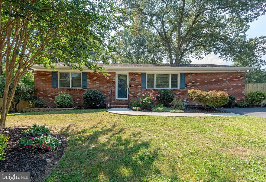 **Please have offers in by Wednesday, September 13th, at 8:00 pm** You will love this stately brick front rancher on huge lot. Pasadena address, with SEVERNA PARK SCHOOLS! Relax and watch the game in your lovely living room with cozy electric fireplace, warm wood flooring, and triple window for a view. Updated kitchen features shaker style hickory cabinets, granite counters, Frigidaire stainless steel appliances, and gooseneck faucet for easy clean up! Spacious primary bedroom addition has room for king sized bed, cherry wood flooring, loads of sunlight with ample Anderson windows, ceiling fan, and dual closets for lots of storage. Updated bath has new tile floor, beautiful white vanity, and white tub/shower and commode. Secondary bedrooms on the main level have wood floors and ceiling fans. The lower level has new luxury vinyl planked flooring and another electric fireplace for fun gatherings.  There is a 4th bedroom and a bath with an amazing soaking tub. Laundry room and storage room complete the lower level. The best is yet to come! Go outside and relax amongst the mature landscaping and dine 'al fresco' on your 32' composite deck with plumbing for a hot tub. Enjoy your after-dinner beverage or make smores on your custom patio with firepit for warmth (2019). Owners replaced the privacy fence in 2018. HVAC was replaced as was the water heater. There is 200-amp service, shed for storage, double lot, Anderson windows, and driveway for parking. This home is close to shopping, movies, restaurants, library, Annapolis, Baltimore, Rt 2, 3, 97, 695, 10, BWI airport, casinos, and train. Pull up the truck and move right in!