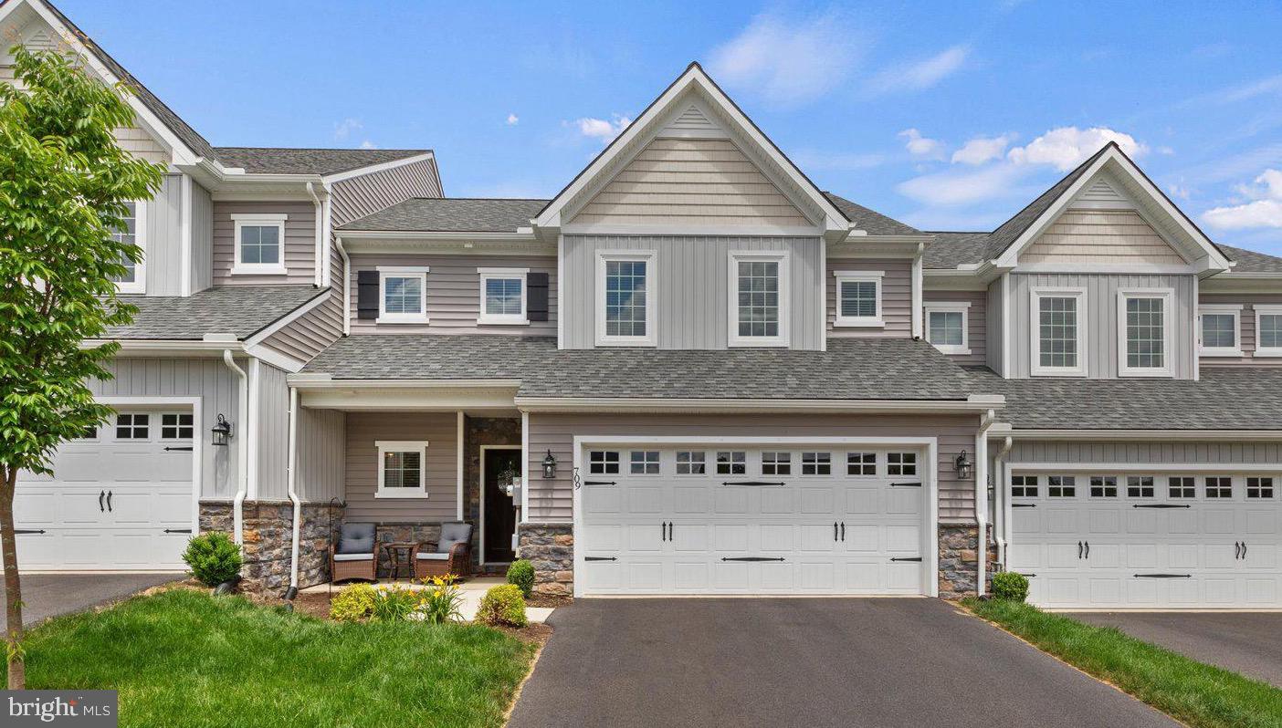 Step right up to this nearly BRAND NEW home in the fantastic Brookridge area of Elizabethtown. With convenient access to highway 283, this location serves as a great spot for those working in Lancaster OR the Harrisburg/Hershey area! At just a little over 1 year old, this fantastic little townhouse has all the right finishes, and plenty of curb appeal. Stepping through the front door you’ll notice the open layout and plenty of natural light streaming in. The family room features a lifted ceiling to give depth and add character to the space, while the natural gas fireplace adds a cozy element for those cold days. The kitchen’s stainless steel appliances, and granite countertops blend perfectly with the hanging barn door to the mudroom/garage space, and the natural gas stove and fantastic island serve as a great way to host family and friends. A dining area and nearby powder room bring all the modern conveniences you’d need in an efficient floor plan on the main level. Don’t forget to check out the rear concrete patio with open views! Upstairs, 3 nicely-sized bedrooms will welcome your family and guests. A big bonus is the upstairs laundry room! The Primary Suite is generously sized and the spacious walk-in closet is a nice touch. Additionally, there’s another full bath with tub/shower combo on the upper level. The basement is unfinished and ready for your storage needs OR a blank canvas for future finishing. Purchase “nearly new” without the wait and get the peace of mind knowing all major mechanicals and structural elements are essentially new!