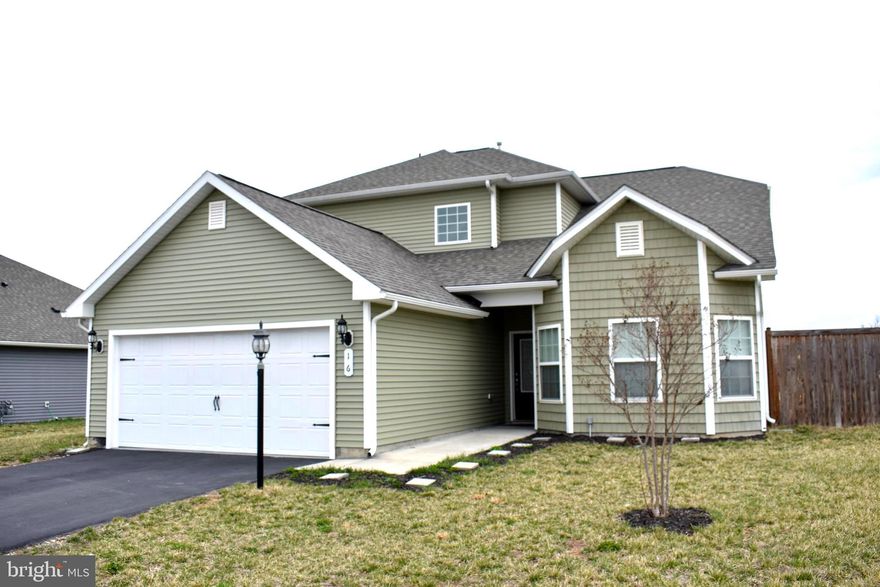 Located on a desirable corner lot, has been thoughtfully updated in 2024 with modern finishes and improvements. It features a brand-new HVAC system, a new roof over the garage, and fresh carpeting throughout. The spacious kitchen is equipped with stunning new granite countertops, while the entire home has been freshly painted for a bright and welcoming feel. The main floor offers a cozy primary bedroom with a beautiful en-suite full bath, providing a peaceful retreat. Upstairs, you'll find three additional generously-sized bedrooms, sharing a full bath. Outside, enjoy the privacy and space of a large, fenced-in yard—perfect for relaxation or entertaining. The home also includes an attached 2-car garage, offering convenience and additional storage. Ideally located just off of Route 9 and only a hop, skip, and a jump to I-81, this home provides excellent access to major routes, making commuting and travel a breeze.  Move-in ready home blends comfort, style, and functionality, making it a perfect place to call your own.