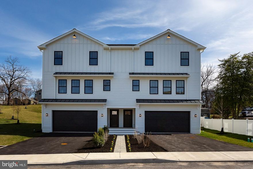 Welcome to The Enclave at St David's. Your new home is waiting. This home is completed and move-in ready.
981 Henry Avenue is part of nine new construction residences in a private enclave near the heart of downtown Wayne. A collection of eight carriage homes and one single-family home, they feature spacious interior living with thoughtful finishes throughout. Live effortlessly between the sanctuary of home and the vibrancy of downtown Wayne’s thriving restaurant scene. This beautiful carriage home is located in a quiet cul-de-sac and has 2911 square feet of living space. Three bedrooms, two full baths, and two half baths. The main floor features 9 foot ceilings and a beautiful, spacious open concept kitchen and living space. A perfect spot to entertain friends and family. Off of the separate dining room you’ll find your outdoor entertainment area with a sprawling deck overlooking the beautifully landscape community. This level also has an additional living space perfect for a formal living space, TV room, or kids space. On the second floor the large primary suite includes an oversized shower with rain head and hand shower as well as a separate soaking tub. The walk-in closet completes the space. Two additional bedrooms, a full bath, and laundry room complete this floor. On the lower level, you’ll find a large living and entertaining space. Large enough for a TV area, bar, and even a pool table. James Hardie siding, black Andersen windows, Azek Vintage Collection decking, Shaw Couture white oak wide plank flooring, GE profile appliances. Located in the award-winning Tredyffrin Easttown school district. Close to the train station, freeways, and King Of Prussia shopping and dining. Don’t miss this opportunity to live in a beautiful new construction home, in a top school district in the state, close to all of the amenities that Wayne has to offer. This home is built and move-in ready. All you have to do is pack your bags. Taxes TBD. This development is 90% complete and no exterior construction.
