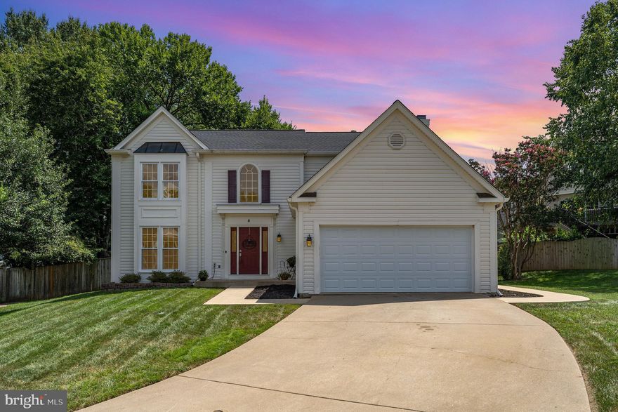 WOW, how many boxes does this home check on your wants and needs list...Colonial on quiet cul-de-sac starting with the beautiful curb appeal and 2 car garage with plenty of driveway parking; nice low maintenance walkways on side and backyard, lush lawn both front and back yards. Enter to hardwood floors throughout, Living room, separate Dining room; Kitchen with gas cooking and stainless appliances approx 4 years old; kitchen island, granite countertops, eat in kitchen area that leads to covered screened room, Family Room with Gas Fireplace. 4 spacious  bedrooms; 2 1/2 baths, Master bedroom with private luxury bathroom with garden tub, separate shower, walk-in closet, ceiling fan; hallway and half bath with new flooring;  Laundry area on Bedroom Level, unfinished basement waiting for your design. Yes, there's more...Roof,  gutters and gutter guards replaced in 2021 and Hot water heater replaced in 2025. Move in ready!! Now you just need to come see it ASAP before it's gone. Note there is only one garage remote.