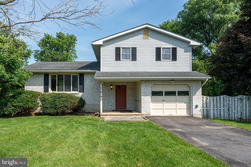 Don't Miss Out Again: Buyer Financing Fell Through! Welcome to 4834 Maple Street,  where peaceful living meets everyday comfort in the heart of Lower Mt. Bethel. Set on a full acre of private, tree-lined land, this inviting 3-bedroom, 1.5-bath split-level home offers the space and setting every family dreams of. Whether you're chasing fireflies in the backyard, hosting weekend BBQs, or relaxing on the screened-in porch with your morning coffee, this home is all about embracing the quiet joys of country living. Step inside to find a bright and sunny living room featuring a charming bay window that floods the space with natural light, perfect for cozy mornings or lively family gatherings. Downstairs, a spacious family room offers a flexible layout for a playroom, home office, or media lounge and leads directly to the screened porch, ideal for breezy summer nights or quiet time away from the hustle. Upstairs, you'll find three comfortable bedrooms and a full bathroom, while a convenient half bath on the main level adds function for daily living. The lot is beautifully set back, offering both privacy and the freedom to play, garden, or simply breathe. With its warm atmosphere, smart layout, and serene surroundings, 4834 Maple Street is more than a house, it’s the perfect place for your next chapter. Did we mention new high efficiency Bosch HVAC unit installed in 2024? Come see what country comfort truly feels like.