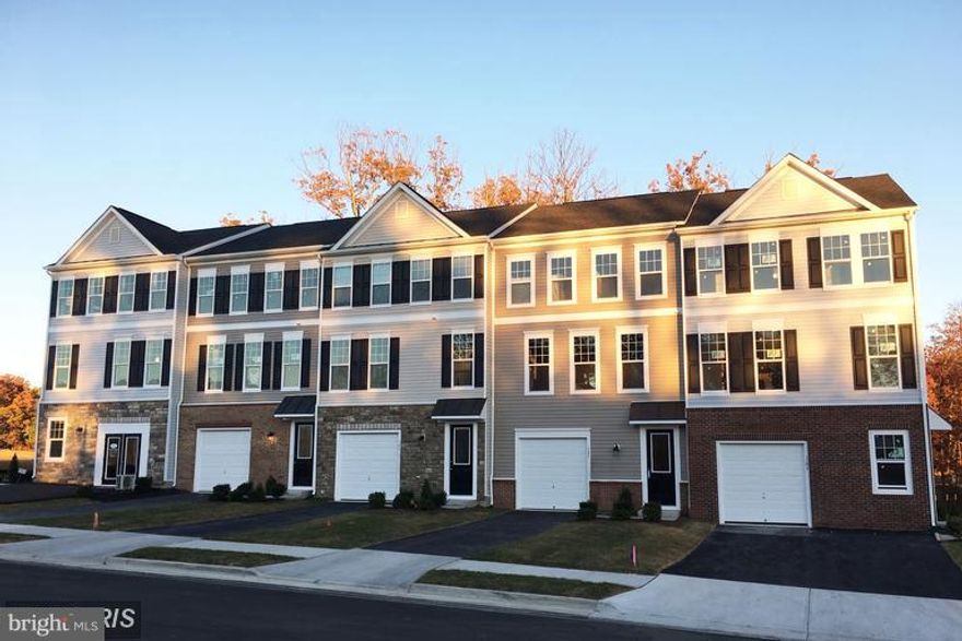 Beautiful new construction with neutral colors and nice upgrades!  Granite counter tops, walk-in closets, nice faux wood blinds, large deck.  Available 1 November.  Contact agent for any questions.  ** Photos are of model unit.  Same floorplan/layout in this unit.