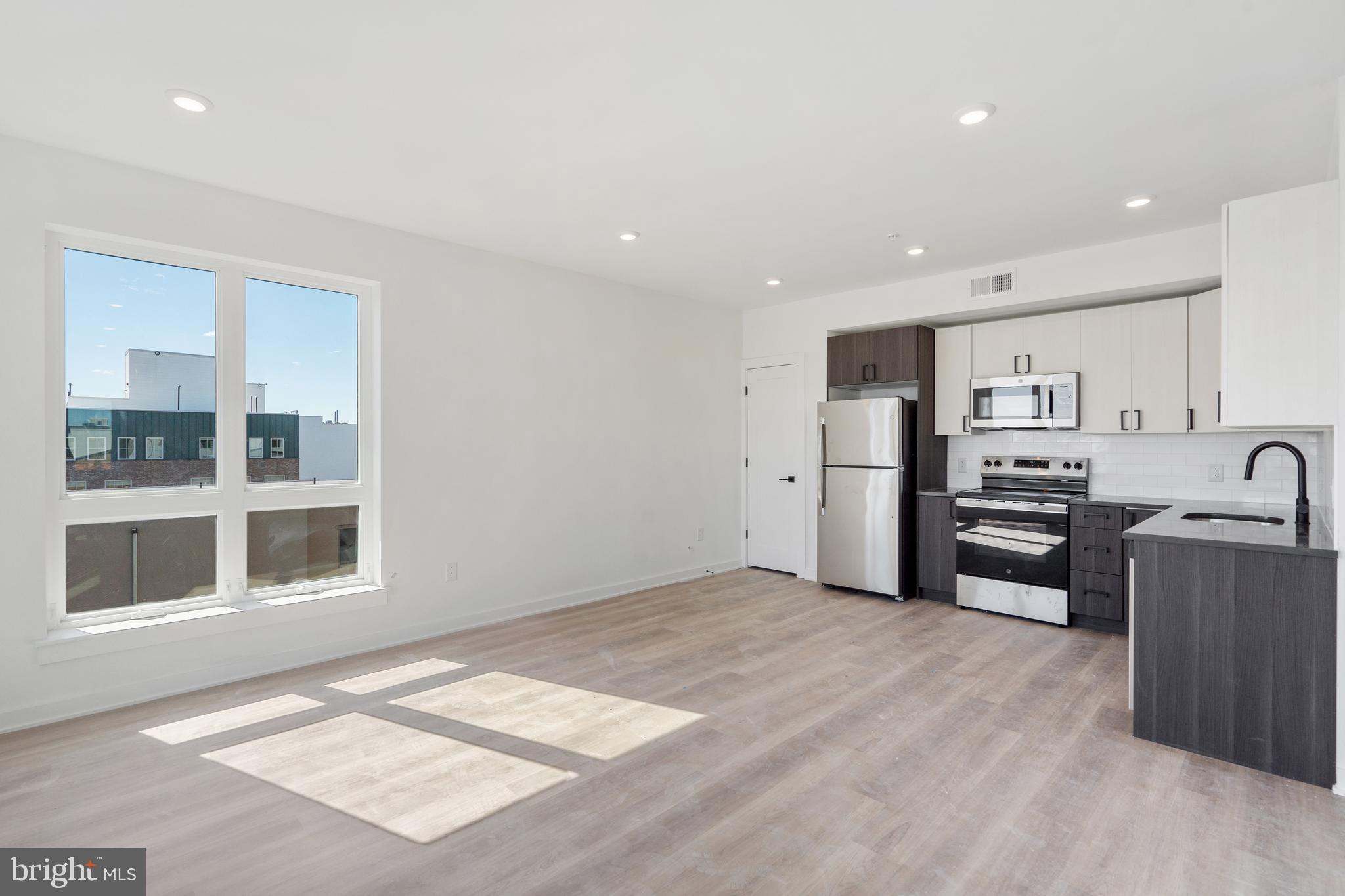 *Now offering up to 3 months free on a 12 month lease and a reduced security deposit of only $500!*
Price reflects 3 months free on a 12 month lease. Base rent is $2475/month.
Introducing Front Street Lofts, sophisticated Fishtown living now available to lease!! This brand-new development offers a collection of thoughtfully designed 1- and 2-bedroom apartments, each crafted to blend contemporary style with comfort.
Experience open-concept living spaces enhanced by modern finishes and high-end amenities. Our pet-friendly units boast in-unit washer/dryers, kitchens adorned with quartz countertops and stainless steel appliances, oversized sound-dampening windows, and elegant luxury vinyl plank flooring throughout.
Residents can also take advantage of on-site amenities, including a bike storage room, secure package room, and a stunning rooftop deck with sweeping city views.
Be among the first to call these sophisticated apartments home—where urban chic meets affordability. Schedule your tour today and discover elevated living in the heart of Philadelphia!