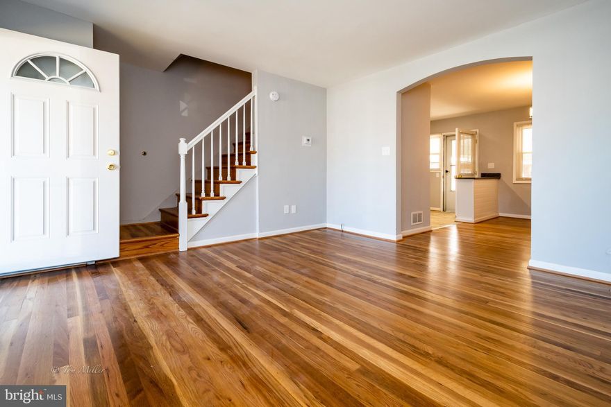 Pristine rehab, 3 Bed, 2 Bath, Townhouse, beautiful hardwood floors, finished lower level with bathroom w/ shower stall,  rear parking pad, granite kitchen countertops, all new HVAC system, new roof.