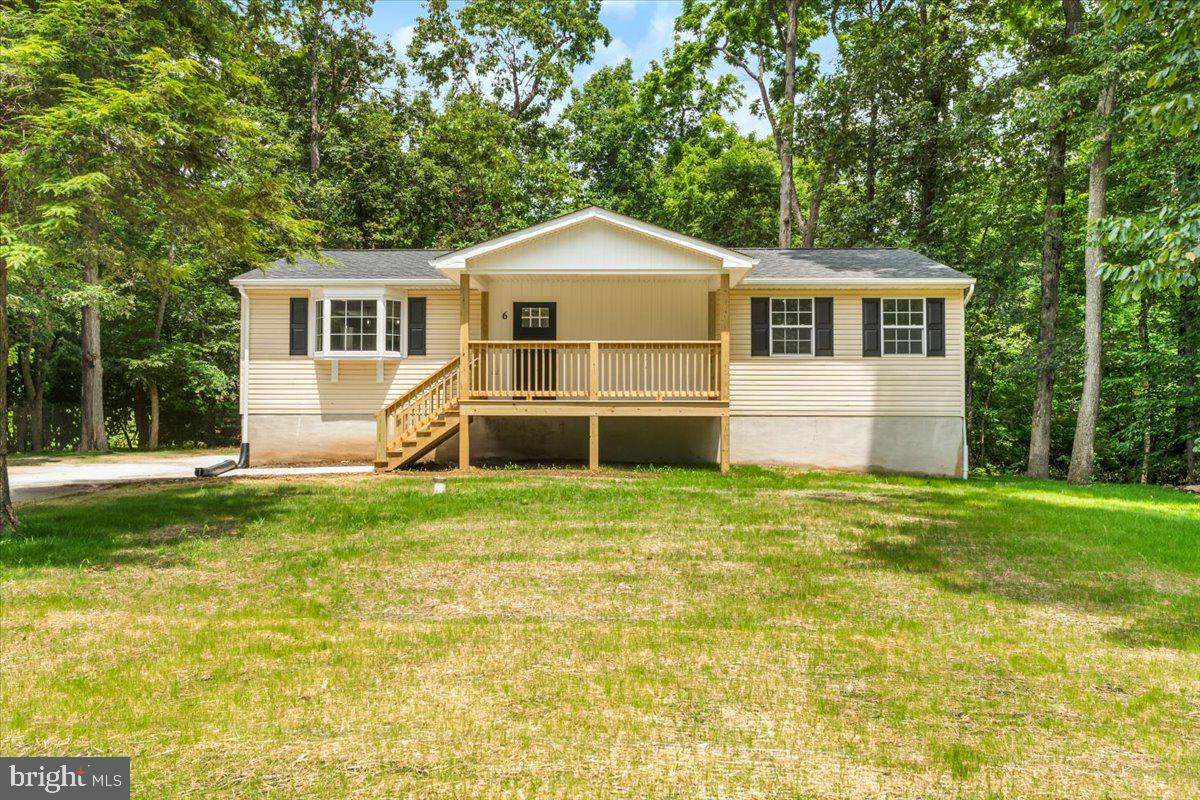 Welcome to your dream home, nestled in the heart of scenic mountain living! This beautifully renovated 3-bedroom, 2-bathroom gem is the perfect blend of modern comfort and rustic charm, ideal for anyone looking to embrace the great outdoors without sacrificing luxury.
Step inside and be greeted by an inviting open-concept layout accented by fresh new flooring that flows seamlessly throughout the space. The heart of the home, a stunning kitchen, boasts gleaming stainless steel appliances, elegant countertops, and ample storage, making it a chef's paradise. Whether you're preparing a cozy family dinner or entertaining friends, this kitchen will not disappoint!
The spacious living area is bathed in natural light, creating a warm and welcoming atmosphere, perfect for relaxing after a day on the slopes. Each of the three bedrooms offers generous space, providing a tranquil retreat for everyone in the family. The two beautifully appointed bathrooms feature modern finishes and thoughtful touches, ensuring your comfort and convenience.
Step outside to discover your private outdoor oasis! The expansive back deck is perfect for summer barbecues or enjoying your morning coffee while listening to the sounds of nature. The covered front porch serves as a charming entryway and is an ideal spot to unwind.
Parking is a breeze with a dedicated driveway that can accommodate multiple vehicles, making it easy for family and friends to visit. And for the outdoor enthusiasts, this property is just a stone's throw away from a premier skiing lodge, offering year-round recreational opportunities, from skiing and snowboarding in the winter to hiking, biking and golf in the summer.
