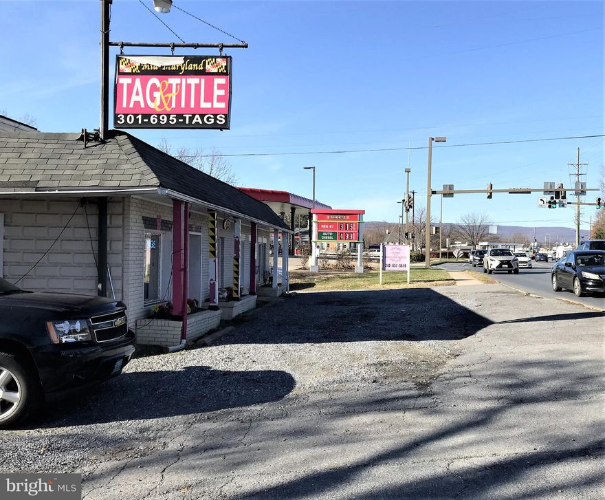 Incredible location near major commuting routes.  Income producing property with great history if making profit with this multi-unit commercial space.  You will find 5 residential type apartments.  The back building has 2 lower and 2 upper level 1 bedroom/1 bath units.  The main building has 1 upper level 2 bedroom/1 bath unit as well as 2 commercial/retail/professional spaces that have had long term tenants.  
The property sits just off Route 15 with road frontage for the commerical tenants.  This location is within 1 mile of main entrance to Ft. Detrick as well as 2 miles to downtown Frederick.  
Residential units recently remodeled and those 5 units will have brand new yearly leases in effect at time of sale.  This is a great opportunity with a great history of profit.  All units are currently occupied.