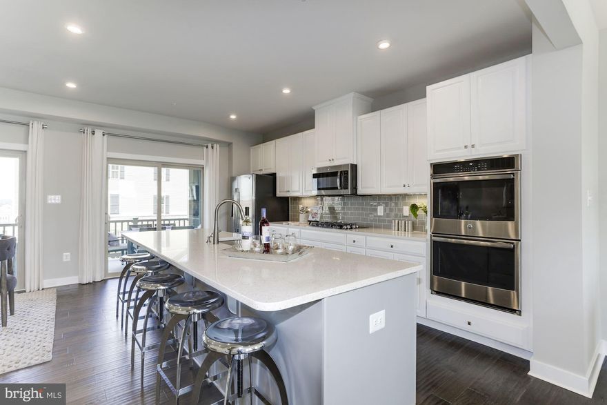 Want a townhome that feels and lives like a single family home? Look no further than the McPherson Grand! Amenities galore at Lake Linganore Oakdale; future retail and best rated schools all within walking distance! Nearly 2,700 sqft, enormous kitchen island, expansive owners suite and covered rear porch!! NOW $7,500 CASH with use of NVR Mortgage! Images Shown Are Representative Only.