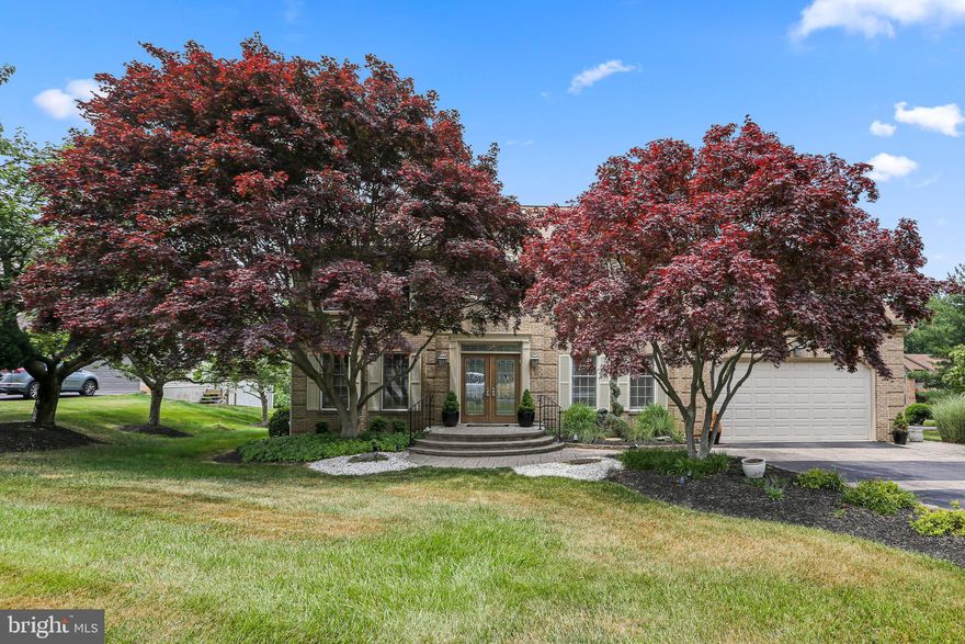 This Meticulously Maintained, 4 Bedroom, 3.5 Bath Home on a .69 acre Double Lot with NO HOA fees, must be seen! Enter into the Foyer and notice Gleaming Hardwood Floors which continue throughout most of the Main Level. To the right of the Foyer is the Bright and Airy Dining Room with a Gorgeous Light fixture and plenty of Natural light. To the left is the Living Room with recessed lighting and French Doors leading to the airy, sun-filled Family Room with Vaulted ceilings, Skylights, and Gas fireplace with floor to ceiling brick facing. The Eat-in Kitchen is centrally located and features Stainless Appliances, Double Wall Oven, ample cabinet and counter space, Island with Breakfast Bar, Pantry, Desk or Coffee nook, Tablespace, and sliders leading to the large screened-in porch and to the sun-filled deck. A Half Bath, Laundry Room, and Access to the 2-Car Garage round out the Main Level. Make your way Upstairs to the Primary Bedroom with Vaulted Ceilings, ceiling fan, carpeting, a Walk-in Closets and additional large wall closet and two attached bathrooms. The ensuite Primary Bath features a Jetted Soaking Tub, Walk-In Shower, and tile flooring. The second Bath features a Double Vanity, Walk-In Shower and Tile flooring, this bath can also be accessed from the hall.  Also on this Level are Three Additional Spacious Bedrooms, Two with Walk-in Closets and another Full Bath with Dual vanity, Tub and separate walk-in shower. The Huge Finished Lower Level has THREE separate areas, including a huge Recreation Room, a Game Room and a Home Office -or your own exercise studio!  Plus, a storage room & sliders to the rear lawn. The immense Rear Yard is perfect for Gatherings with Friends and Family. A cement pad is ready for your Basketball hoop and the Play Equipment coveys. Updates to this home include New HVAC (2022)! Convenient to Commuter routes, Shopping, Dining and Schools, this home Must be Seen!