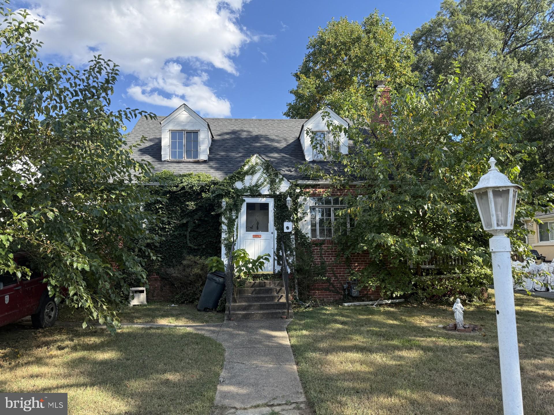 Three bedroom, two full bath brick cape cod. Newer roof. Needs complete restoration. Agents and buyers must sign HAZARDOUS CONDITION DISCLOSURE AND POTENTIAL HAZARD WAIVER in documents before entering property. Masks are recommended. Sold strictly "AS IS, WHERE IS". Offstreet parking.