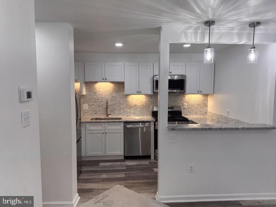 ******SPECIAL 1/2 of Security Deposit to move in !!!!  AVAILABLE  TODAY!

Welcome to this beautifully renovated 2-bedroom, 2-bathroom, first-floor unit located in a quiet, well-maintained community in Annapolis. With an abundance of natural light, spacious rooms, and modern upgrades throughout, this home offers a perfect blend of comfort, style, and convenience.

From the moment you step inside, you’ll be impressed by the thoughtful design and attention to detail. The entire unit has been completely renovated, featuring brand-new flooring throughout, sleek finishes, and recessed lighting that enhances the bright and airy atmosphere. The large, open living spaces provide plenty of room for both relaxing and entertaining, with seamless flow from one room to the next. The living and dining areas are spacious enough to accommodate a variety of furniture arrangements, offering flexibility to make the space your own.

The fully upgraded kitchen is a true highlight, offering modern appliances, plenty of counter space, and ample cabinetry for all your storage needs. Whether you're preparing everyday meals or hosting guests, this kitchen is sure to impress. The adjoining dining area provides an ideal spot to enjoy your meals with family or friends, and the open floor plan makes entertaining easy.

Both bedrooms are generously sized, with large windows that let in plenty of natural light, creating a welcoming and peaceful atmosphere. Primary bedroom features a spacious walk-in closet, providing ample storage space for all your belongings. The two beautifully renovated bathrooms are finished with stylish fixtures, modern tiling, and plenty of space to relax and unwind. The primary bedroom enjoys its own private en-suite bathroom, offering added convenience and privacy.

The property is also incredibly convenient, located just minutes from shopping, dining, and entertainment options in downtown Annapolis. Commuting is a breeze with easy access to major highways and routes, making this a perfect spot for those who want to enjoy the tranquility of a residential neighborhood without sacrificing proximity to the best of Annapolis.

This stunning 2-bedroom, 2-bathroom unit is truly a rare find in the area, offering modern living in a peaceful and desirable location. Don’t miss the opportunity to make this renovated home yours! Schedule a showing today to experience all this property has to offer.