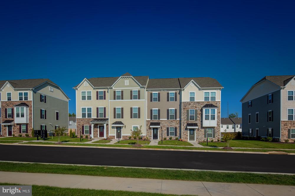 Beethoven at Highgate Village. 3BR, 2.5BA. Upper level has Owner's Suite with walk-in closet and private bath, 2 additional Bedrooms, hall Bath and Laundry. Main level is open concept with Living Rm, Powder Rm, Dining Area, and Kitchen with a large island & Granite countertops, pantry, and GE SS Appliances including refrigerator and gas range. The lower level has the Foyer, Study and Recreation Rm with double patio door walkout to the back yard. Images shown are representative only.