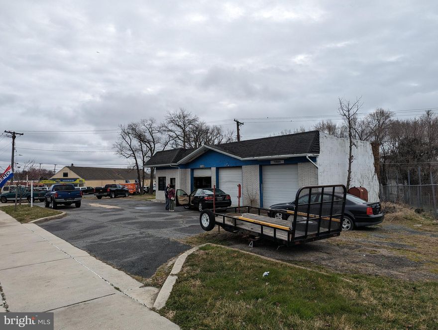 $100,000 LIST PRICE SUGGESTED OPENING BID AT AUCTION. ****NO PRE BID**** AUCTION FRI., April  14, 2023 @ 11:00AM ON PREMISES.  Commercial corner lot fronting approx. 199ft along Rte. 40 with great traffic count and exposure. Improved by block car repair building approx. 30ft by 60ft. Small office, customer service area, and 3 service bays with lifts. Approx. 1,600 interior sq. ft. Bathroom with exterior entrance. Flat tar roof in need of repairs. Compressor in building. Oil FHA heat. Public water & sewer.  NOT FOR RESIDENTIAL USE.    Owner financing available for qualified purchaser. 15% down on total purchase price (Bid Price + Buyer’s Premium). 15 year Am. 6% interest rate. Full terms announced day of auction".
