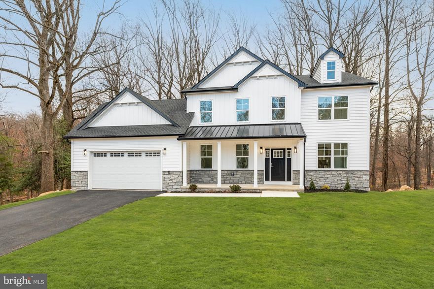 Immerse yourself in modern luxury in this stunning new construction single-family home. This expansive property is the epitome of style and sophistication. Boasting over 3,200 square feet of living space, it offers the perfect blend of comfort and grandeur. Nestled on a gorgeous, wooded lot, the home provides a sense of tranquility while remaining close to all the conveniences you might desire.  A grand foyer sets the stage. As you step inside you will be captivated by the elegance of the two-story foyer that awaits you. A convenient powder room, walk-in closet, and mudroom with access to the attached two-car garage ensure a clutter-free and organized entryway. Beyond the foyer lies the heart of the home—an open-concept living area, designed for seamless entertaining and relaxation. The gourmet kitchen, fit for even the most discerning chef, features a center island with seating, upgraded cabinetry and hardware, and top-of-the-line appliances. The elegant formal dining room, located adjacent to the kitchen and also accessed via the foyer area, is perfect for hosting unforgettable dinner parties and entertaining in style. The kitchen also opens to a spacious breakfast area, which flows seamlessly onto a large deck – perfect for enjoying outdoor meals or relaxing in the fresh air. The adjoining living room features a gas fireplace, creates a warm and inviting atmosphere. Upstairs, discover your primary bedroom suite, a true oasis of peace and relaxation. The en suite bathroom boasts upgraded fixtures, a dual vanity, a luxurious walk-in shower, and a spacious walk-in closet. Three additional bedrooms, a laundry room, and a shared hall bathroom complete this level of the home. The unfinished basement offers a blank canvas to create your dream space, whether it’s a home theater, a gym, or an additional bedroom. The possibilities are endless! Situated in a prime location in desirable Southampton, this home offers easy access to everything you need, including restaurants, shops, recreational facilities, and major commuter routes. Don’t delay in securing this home as your own so you may begin living the life you deserve in this exquisite property.