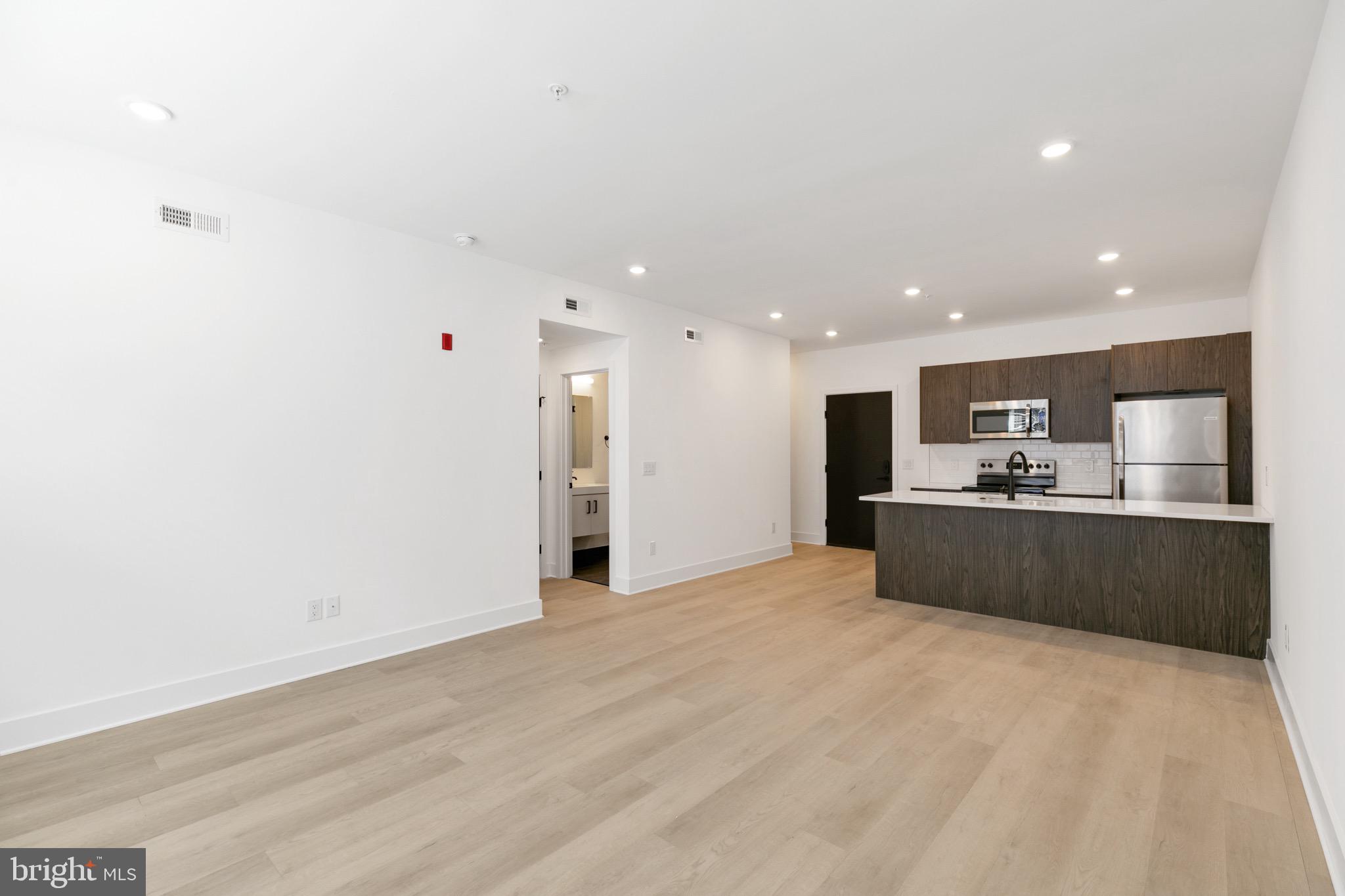 Welcome to Brand New Richmond St Luxury Condos. Each unit is equipped with large beautiful islands, and large coat closet. These sophisticated apartments with a modern influence sit on a quiet street with access to the subway and major highways. Presented by a handsome red brick exterior and gorgeous, airy interiors, you can now live in a touch of elegance at a very affordable price. The building has been sound proofed between floors for comfort. Fantastic area for short walks to public transportation and great eats. Near all major modes of public transportation for extended travel throughout the city. In addition, we’re located just a few blocks from Girard Avenue and York St, offering easy access to the Expressway, making commuting to Center City, University City, Art Museum, Northern Liberties, and South Philly. These apartments boast spacious nine foot tall ceilings, modern black frame energy efficient windows, led recessed lighting, and wide-plank premium grade vinyl hardwood flooring throughout. Change your life for the better in this amazing 1 bedroom 1 bathroom!
ONLY PAY SECURITY DEPOSIT AND FIRST MONTHS RENT TO MOVE IN! (offer expires soon)
LATCH REMOTE ACCESS TO THE BUILDING! (open doors with your phone, smart watch, key card, and touchpad)
PARKING IS AVAILABLE FOR $150 A MONTH! DEDICATED SPOT FOR ELECTRICAL CARS!
ELEVATOR IN BUILDING!
TENANT IS RESPONSIBLE FOR WATER FEE OF $35/MONTH ON TOP OF RENT!
VIDEO OF ACTUAL UNIT AVAILABLE UPON REQUEST