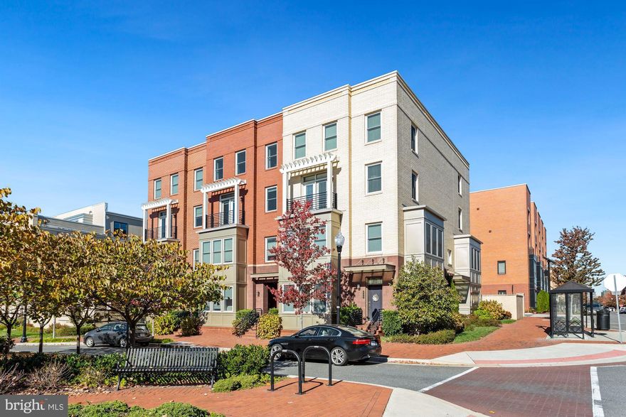 This exquisite three-level Potomac Yard Condominium offers spacious townhouse living in one of the most active and amenity-filled areas in the region. Built in 2014, the home includes three bedrooms, two-and-a-half bathrooms and covers more than 2,800 square feet. With garage and front-door entrances on the main level, the second level features an expansive and bright living area with room for ample seating as well as space for other pursuits such as a reading or music area—large enough to comfortably fit a grand piano. The living area transitions into a large dining space anchored by a two-sided gas fireplace. As you move to the opposite side of the fireplace, you’ll enter an additional sitting/living area connected to the kitchen, well-suited for more entertaining. The kitchen features stainless steel appliances, a gas stovetop, oven, a ton of quartz counter space, and an additional large island with space for bar seating. Near the windows on the far side of the kitchen next to the pantry is an additional breakfast area that leads to an outdoor balcony. Up to the next level, the huge master bedroom includes a wonderful sitting/reading area, walk-in closet, and master bath with a huge walk-in shower, double sinks, granite counters, and ample cabinet storage space. An additional large hall bathroom includes granite counters, a tub-shower combination and additional cabinet space. A second and third large bedroom rounds out the upper floor. All bedrooms include carpet and track lighting. The entire home features high ceilings, large windows with custom shades, and enjoys an abundance of bright, natural light. 

The home itself is just the beginning though. You can’t beat the location. It about three miles from Reagan Washington National Airport. In addition, you’re just steps from the Crystal City Potomac Yard Transitway on Richmond Highway and also only a little more than a half mile from the planned Southwest Access Pavilion to the new Potomac Yard Metro Station scheduled to be completed in the fall of 2022. Potomac Yard Park and Potomac Yard Playground are easily walkable, as well as restaurants and shops on the north end of Old Town, and the beautiful Old Town waterfront with its shops and restaurants is less than two miles away. Don’t let this beautiful home and great location slip away.
