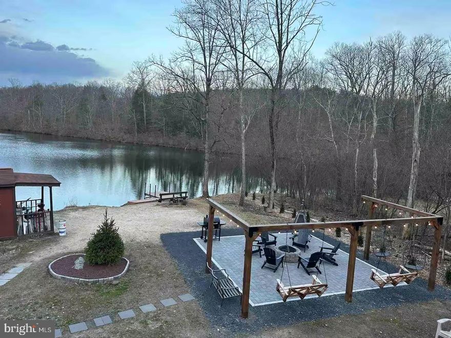 Beautifully renovated lakefront home on a rare double lot in the sought-after Winona Lakes community. Fully updated in 2024, this property offers 4 bedrooms, 2 full bathrooms, a modern kitchen, dining area, and a bright living space perfect for relaxing or entertaining. The finished basement provides additional flexibility and can easily serve as a 5th bedroom, game room, or lounge area.

Enjoy year-round relaxation in the sunroom with hot tub, plus a custom Finland-made spa for a true retreat experience. Step outside to a beautifully designed outdoor living area with a built-in fireplace overlooking the lake, creating the perfect setting for gatherings or peaceful evenings by the water. With direct lake access, you can kayak, boat, and fish right from your own backyard.

Currently operating as a successful short-term rental generating approximately $98,000 in 2025 income, making it ideal as a primary home, vacation getaway, or income-producing investment. Conveniently located near skiing at Shawnee Mountain Ski Area and the scenic trails and waterfalls of Bushkill Falls.