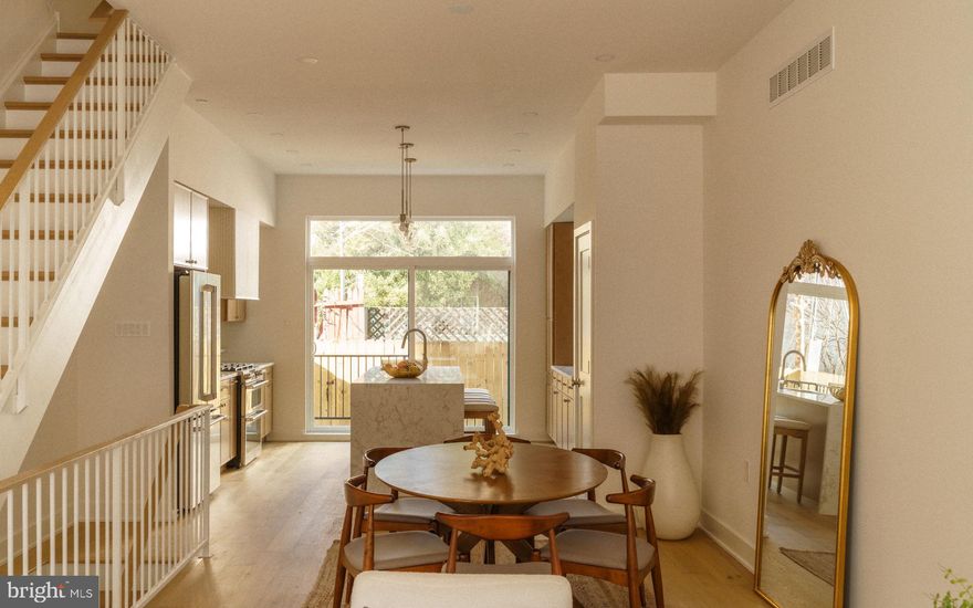 **5.375% interest rate available through preferred lender + Seller is offering a credit equivalent to TWO YEARS of parking costs to be applied at settlement with an acceptable offer.** A rare chance to own a newly constructed, three-story single-family home in Rittenhouse, 520 S 17th Street stands out for its timeless layout, refined finishes, and unparalleled convenience—all within the Greenfield School Catchment. Expertly crafted by esteemed Philadelphia builder Waybar Development and designed by A2 Design Group, this 4-bedroom, 3-bathroom residence includes a finished basement, rooftop deck, and a 10-year tax abatement.

Enter into the main floor that features a bright, open-concept kitchen, dining, and living area with 10-foot ceilings, wide-plank Bruce Silverwood hardwood flooring, and natural light throughout. The living space flows seamlessly into the private rear backyard—ideal for entertaining or relaxing outdoors. The kitchen is outfitted with fluted Timber cabinetry by Fabuwood, Taj Mahal quartzite countertops, and a GE Café appliance suite, brought together with ceramic Tranquil tile accents and a Sharp microwave drawer.

Upstairs, you'll find two spacious bedrooms with a full hallway bathroom and laundry conveniently located on the second floor. The next level is a full-floor primary suite featuring a massive walk-through custom closet, a 72” red oak double vanity, and an oversized walk-in shower with dual rain heads and Delta Trinsic fixtures in champagne bronze—finished with iron-shaded lighting and thoughtful tile selections throughout.

The top floor opens to a full-sized rooftop deck offering sweeping city views, with a dry bar just inside for effortless entertaining. Downstairs, the finished basement adds even more flexible living space with a bonus living area, a full bedroom, full bathroom, and ample storage throughout.

Interior details such as white iron railings, oak handrails, and high-end finishes tie the home together with warmth and cohesion. With no HOA or condo fees and a design-forward aesthetic, this home is a truly rare new construction offering in the most sought-after and established neighborhood in all of Philadelphia. Inquire today to cement your place in one of Rittenhouse’s most exclusive new construction offerings before it's gone.