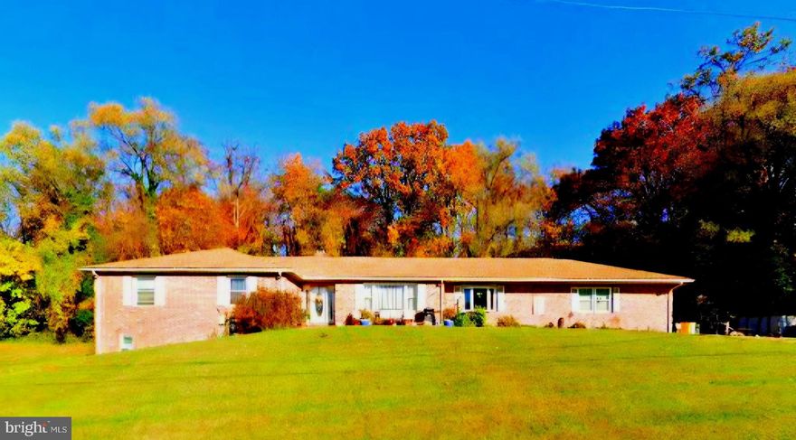 Awesome Ranch-style diamond home in the neighborhood ** 1.53 acre lot  **2374 finished sq ft Upstairs and 1218 finished sq ft downstairs**1100 sq ft unfinished in the lower level **Center Hall floor plan with formal living room, formal dining room, separate family room with stone woodburning fireplace, spacious kitchen **4 bedrooms upstairs with 2 full baths and 2 half baths**Owner's bedroom has walkin closet and full bath** ** Family room with slider to a Screened porch**Hardwood floors main level ** Lower level is finished with 2 bedroom, 1 full bath, family room, kitchen**  Public water and public sewer ** Natural gas heat ** Gas cooking on main level ** 3 ceiling fans in family room, kitchen, dining room ** 2 car garage ** Woodstove "as is" (pipe "as is") **Microwave main level "as is"