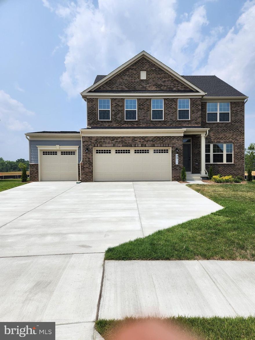 Welcome to this stunning Brand-new colonial with craftsman details and a finished basement. Located in on a premium lot, this beautiful home boasts 6 bedrooms, 4 bathrooms, top of the line fixtures, and a 3-car garage. As you approach the home, you'll be welcomed by an inviting front porch. Inside, you'll find custom lighting, a gourmet kitchen with mocha cabinets, granite counters, a morning room, and a full room with en-suite bathroom. The family room features a cozy gas fireplace, perfect for chilly nights. Upstairs, you'll find the palatial primary suite with huge walk-in closet and a huge primary bath. Downstairs, the finished basement offers additional living space, bedroom, and endless possibilities for relaxing and entertaining. This home is conveniently located near major commuter routes, DC, and other great locations. Don't miss your chance to own this stunning home in a fantastic location!