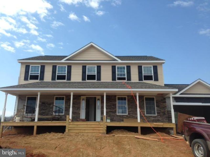 Quality built Colonial on 3+ acre lot. Stone Front with vinyl on 3 sides.  Maintenance free exterior. 20x12 Deck. Gourmet Kitchen with Granite counters and tiled floor. All baths are tiled. Hardwood on Main Floor. Family room with fireplace. 2 car garage with garage door opener.  Master bedroom has tray ceilings, master bath has tile, separate shower and tub. Full unfinished basement. Great buy!!