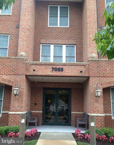 Photo of 7065 Heritage Hunt Drive #208, GAINESVILLE, VA 20155 (MLS # VAPW2117452)