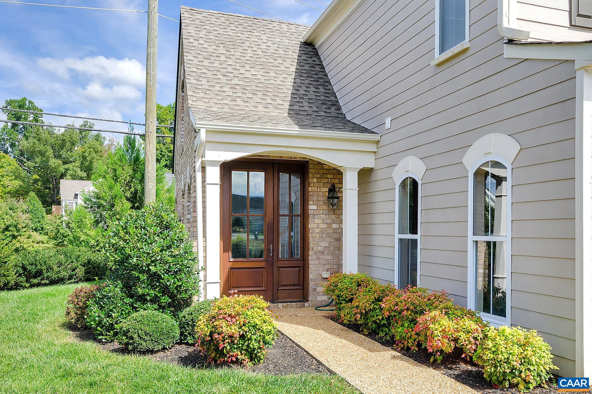 Nestled in The Village of Highlands in scenic Crozet, this like-new 3-bed, 2.5-bath villa offers 1,450 sq. ft. of stylish, low-maintenance living. Enjoy the feel of a private country neighborhood with mountain views, plus the convenience of town life. This energy-efficient home boasts a brick & Hardie plank exterior, solid mahogany front door, and cathedral ceiling. The gourmet kitchen features granite countertops, maple cabinets, and stainless steel appliances. Brand new plank flooring graces the main level, while a gas fireplace with a slate surround adds warmth. Relax in the luxury master suite with a garden tub & separate shower. Additional highlights include a washer & dryer, 2-car garage with an insulated door, private patio, and professional landscaping. Located on a cul-de-sac in the Western Albemarle school district, this villa is the perfect blend of comfort, efficiency, and elegance. Schedule your showing today!