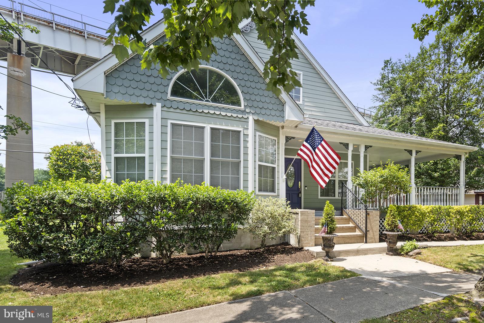 Historic Chesapeake City, a dream location! Nestled between homes built in the 1800's, this tremendous home was built in 2002. It fits well, having the charm of yesteryears but the conveniences of today. The covered porch is large and inviting, room for parties/ social gatherings and a rear enclosed private patio were the builders favorites. The main floor offers a unique living room with cathedral ceiling, fireplace with restored woodwork and built in shelves for displaying/storage. Kitchen/Dining/Sitting room is all open and is the HUB of the house. Loads of cabinets, corian countertops and wonderful built in computer/office area. Owners suite includes two walk in closets and private bath, two separate sink area and walk in shower. The incredibley large second bedroom and private bath are found on the second floor along with an in/law suite/apartment (approx. 1,000 sq ft) with its own private entrance. Full size basement with house and garage entrances, endless possibilities! Oversized two car garage. This Chesapeake City location comes with a lifestyle, scenic walks, canal views, restaurants, entertainment, town boat slips. You will truly STAYCATION forever!