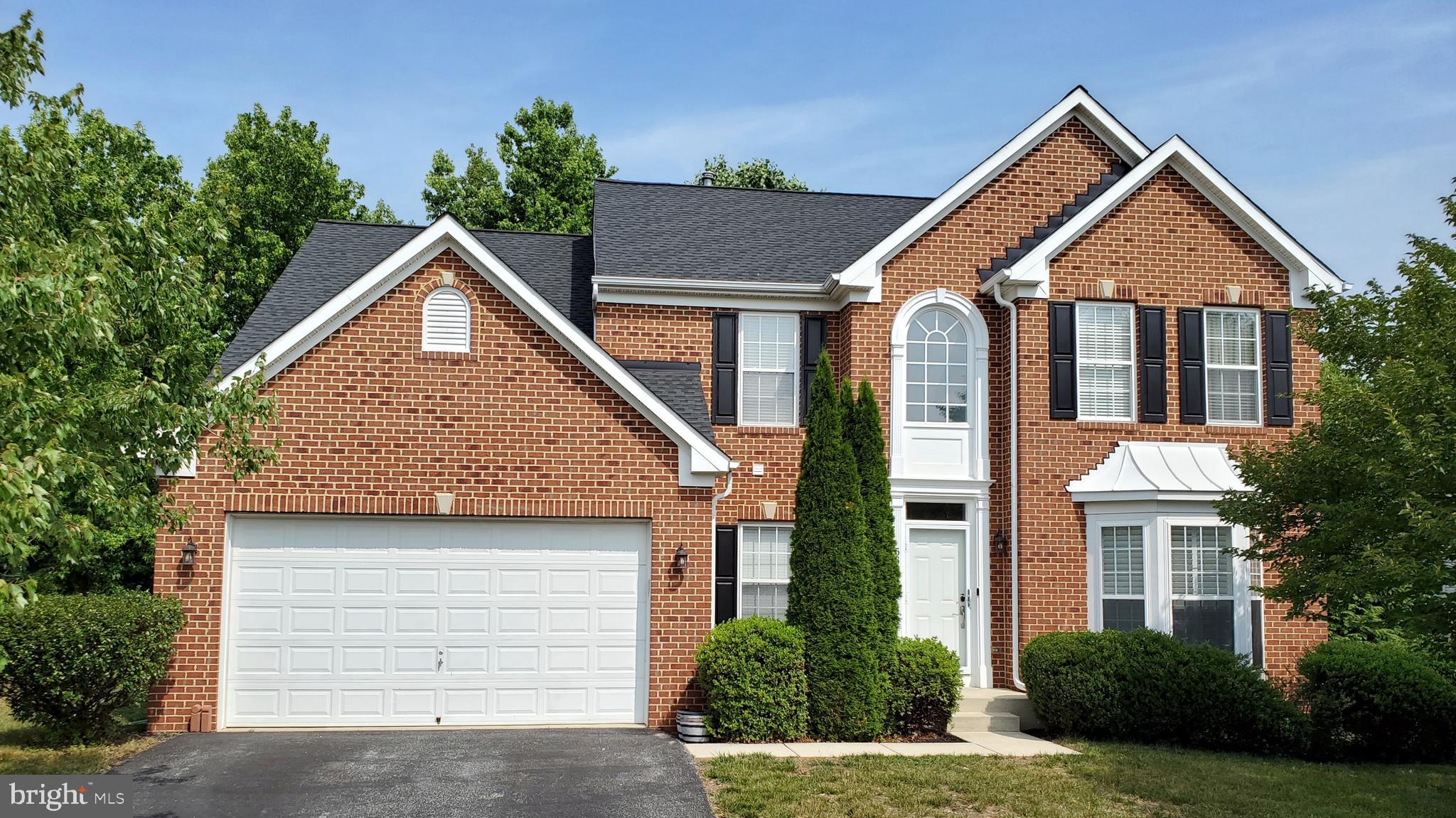OPEN HOUSE HAS BEEN CANCELLED. You are going to want to call this one home. Located on a premium lot backing to trees, this stunning 4 bedroom 2 &1/2 bath with fully finished basement features gleaming freshly refinished hardwood floors throughout the first floor and boasts a chef's kitchen with wonderful work island, light granite countertops, and stainless steel appliances, which include a new refrigerator. The large family room is open to the kitchen, includes a warm gas fireplace, and is loaded with windows. The formal living room with tons of natural light and new plantation shutters and is currently being used as a dining room. The powder room is right off the light-filled two-story foyer and has storage in the vanity and a vessel sink. A first-floor laundry room right off the garage is sure to be a huge convenience. Head upstairs and you will notice a spacious owner's suite with a large adjoining master bath including updated granite countertops, two vessel sinks, a stand-alone shower, and a large whirlpool bathtub. The main bedroom also includes TWO, large walk-in closets. There are three more upstairs large bedrooms for guests and family. The fully finished lower level is awesome and features an entertainment area and a private media area. There is also a possible 3rd bathroom rough-in). The recently replaced sliding glass doors open to the large deck that leads down to a fenced backyard and backs to trees.