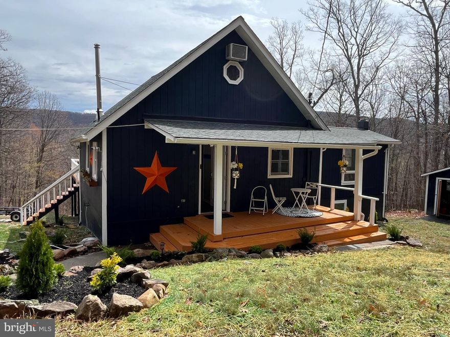 West Virginia Country Roads will get you here!  This Must See Property has Easy Access.  All the Major Components have been done for you.  New Roof, Fresh Paint, New Drainage, New Kitchen, New Flooring, New Bushes and Landscaping.  3 Bedrooms, 2 Bathrooms, Hardwood Floors, Fourth Bonus Room and the Lower Level could be an Additional Office (for Remote Working), Great Room, Play room, the Possibilities are Endless.  High Cathedral Ceilings.  Storage Shed has Electric run to it.  Huge Beautiful Deck with Beautiful Mountain View, Great for Entertaining or Enjoying Nature.  Also a Seasonal Sunroom.  Beautiful Seasonal Views.  Enjoy the Outdoor Fire Pit. Very Peaceful and Quiet!  Approximately 1800 sq ft, What More Could You Ask For?!