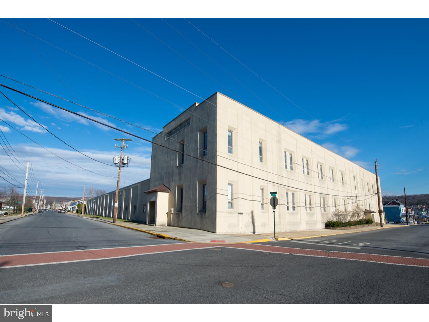 The Cumberland Silk Mill is an exceptional property located within the Borough of Emmaus. At over 57,000 square feet this building was most recently occupied by Rodale Press. Housing their publication offices, photo & video studio locations this incomparable building features natural light, large open hallways and tremendous opportunity for "flexing" the current spaces for your business needs. Additional features include the commercial kitchen, reception area, loading docks and 135 parking spaces within the five parcels included in this sale. Tremendous mixed use potential exists for commercial, conversion to residential apartment space or a combination. Located within walking distance of the downtown and close proximity to major commuting routes.