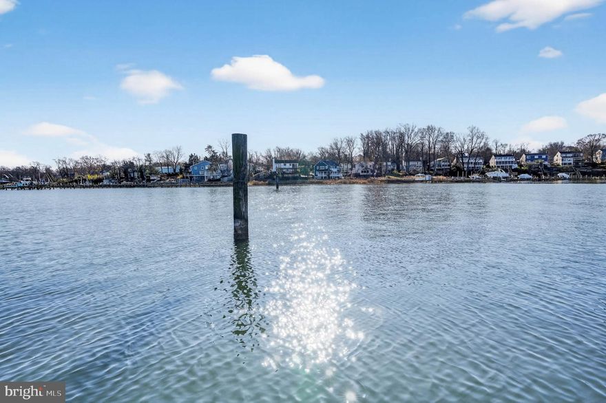 Waterfront Living at Its Finest with Private Sandy Beach and Deep Multiple Slip Pier

Discover the perfect blend of comfort, beauty, and the Chesapeake Bay lifestyle in this exceptional 5-bedroom, 3-bathroom waterfront home, nestled on a serene .52-acre lot in the sought-after community of Weatherly. From your own sandy beach to a multiple slip deep-water pier with 4'+ MLW, this property offers the rare opportunity to live each day surrounded by the best of coastal Maryland.

Inside, the main level welcomes you with warm hardwood floors, vaulted ceilings, and walls of windows that pull the water views into every corner of the home. The spacious living room features a striking cathedral ceiling and wood burning fireplace with mantel and opens to an expansive deck overlooking Deep Creek, the Magothy River, and the sparkling Chesapeake Bay beyond—an ideal setting for morning coffee, evening sunsets, or year-round entertaining.

An open-concept kitchen flows seamlessly into the dining and family rooms, all positioned to capture the abundant natural light and panoramic water views.  Enjoy crab feasts or card games your waterfront  porch    A main-level office or bedroom and a full bathroom with a walk-in shower offer flexibility and convenience for guests or multi-generational living.

Upstairs, you’ll find four well-appointed bedrooms and two full bathrooms. The primary suite includes a private ensuite with a dual vanity and walk-in shower, creating a peaceful retreat. Two additional bedrooms feature balcony access, giving you elevated vantage points of the water—perfect for savoring sunrise skies or quiet evening breezes. The fifth bedroom offers its own water view and a generous closet.

Outdoors, the shoreline becomes your backyard playground—swim, kayak, fish, or simply sink your toes into the sand.  If you prefer floating on a raft in your waterfront in ground pool---your pool is ready and waiting!

This is more than a beautiful house. It’s a lifestyle. A retreat. A place to breathe deeply and feel truly at home.

Beyond the home itself, the Weatherly community enhances your lifestyle with its community beach and community pier, all within a quiet, friendly neighborhood that feels worlds away yet remains close to everything you need.  Love the flexibility of having Broadneck Blue Ribbon public schools and the convenience of being just minutes from downtown Annapolis and an easy commute to DC and Baltimore.  

This is more than a home—it’s an experience. A sanctuary. A place where the rhythm of the water becomes part of the way you live.

Come fall in love with waterfront living and make every day feel like a vacation.  

Make Sure to View the Video Tour

Additional Parcel--1019 Landon Lane, .482 Acre Raw Land is Also for Sale--MDAA2132194 and is currently under contract but accepting back up contracts

Upgrades Include:  2025-Pier Rehab included replacing 4 pilings, 50 percent of deck boards, installed new clothes dryer; 2024-Renovated Main Level Bathroom to include tile flooring, installation of oversized walk in shower with tile surround and stone flooring, toilet, vanity light fixtures and accessories, Installed privacy fence around the inground pool; 2023-Installed clothes dryer; 2022-Installed New Roof, New dishwasher,  Installed Boat lift on dock with 200 W Electric Panel Box at the Dock, Installed Reverse Osmoses Water Filtration System at the Kitchen Sink, 2019- Installed Water Heater, Installed Flow by Moen--Automatic water shut off should a pipe fail, Installed Enviro Pellet stove in the Family Room; 2018-Installed Pool Liner for Inground Pool; 2016-Installed New Refrigerator in the Kitchen