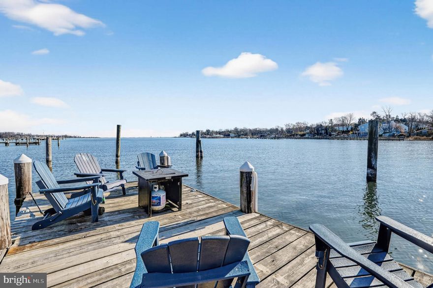 Waterfront Living at Its Finest with Private Sandy Beach and Deep Multiple Slip Pier

Discover the perfect blend of comfort, beauty, and the Chesapeake Bay lifestyle in this exceptional 5-bedroom, 3-bathroom waterfront home, nestled on a serene .52-acre lot in the sought-after community of Weatherly. From your own sandy beach to a multiple slip deep-water pier with 4'+ MLW, this property offers the rare opportunity to live each day surrounded by the best of coastal Maryland.

Inside, the main level welcomes you with warm hardwood floors, vaulted ceilings, and walls of windows that pull the water views into every corner of the home. The spacious living room features a striking cathedral ceiling and wood burning fireplace with mantel and opens to an expansive deck overlooking Deep Creek, the Magothy River, and the sparkling Chesapeake Bay beyond—an ideal setting for morning coffee, evening sunsets, or year-round entertaining.

An open-concept kitchen flows seamlessly into the dining and family rooms, all positioned to capture the abundant natural light and panoramic water views.  Enjoy crab feasts or card games your waterfront  porch    A main-level office or bedroom and a full bathroom with a walk-in shower offer flexibility and convenience for guests or multi-generational living.

Upstairs, you’ll find four well-appointed bedrooms and two full bathrooms. The primary suite includes a private ensuite with a dual vanity and walk-in shower, creating a peaceful retreat. Two additional bedrooms feature balcony access, giving you elevated vantage points of the water—perfect for savoring sunrise skies or quiet evening breezes. The fifth bedroom offers its own water view and a generous closet.

Outdoors, the shoreline becomes your backyard playground—swim, kayak, fish, or simply sink your toes into the sand.  If you prefer floating on a raft in your waterfront in ground pool---your pool is ready and waiting!

This is more than a beautiful house. It’s a lifestyle. A retreat. A place to breathe deeply and feel truly at home.

Beyond the home itself, the Weatherly community enhances your lifestyle with its community beach and community pier, all within a quiet, friendly neighborhood that feels worlds away yet remains close to everything you need.  Love the flexibility of having Broadneck Blue Ribbon public schools and the convenience of being just minutes from downtown Annapolis and an easy commute to DC and Baltimore.  

This is more than a home—it’s an experience. A sanctuary. A place where the rhythm of the water becomes part of the way you live.

Come fall in love with waterfront living and make every day feel like a vacation.  

Make Sure to View the Video Tour

Additional Parcel--1019 Landon Lane, .482 Acre Raw Land is Also for Sale--MDAA2132194 and is currently under contract but accepting back up contracts

Upgrades Include:  2025-Pier Rehab included replacing 4 pilings, 50 percent of deck boards, installed new clothes dryer; 2024-Renovated Main Level Bathroom to include tile flooring, installation of oversized walk in shower with tile surround and stone flooring, toilet, vanity light fixtures and accessories, Installed privacy fence around the inground pool; 2023-Installed clothes dryer; 2022-Installed New Roof, New dishwasher,  Installed Boat lift on dock with 200 W Electric Panel Box at the Dock, Installed Reverse Osmoses Water Filtration System at the Kitchen Sink, 2019- Installed Water Heater, Installed Flow by Moen--Automatic water shut off should a pipe fail, Installed Enviro Pellet stove in the Family Room; 2018-Installed Pool Liner for Inground Pool; 2016-Installed New Refrigerator in the Kitchen