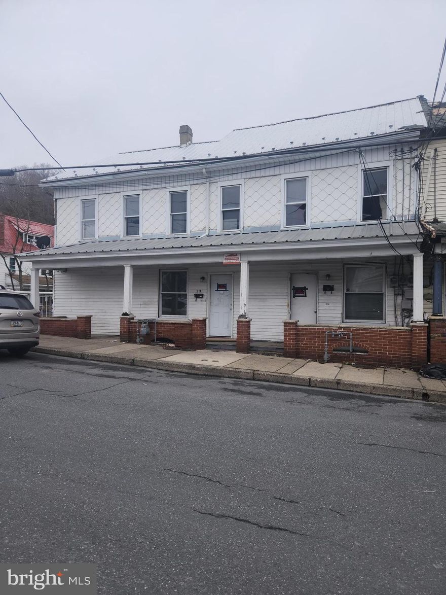 This property had been a 2 unit, each unit being 3 bedrooms and one bath.  It sustained fire damage.  The property was rented at $825 and 775.  Bring this property back to life and one large home or continue as a 2 unit investment property.  This property offers potential