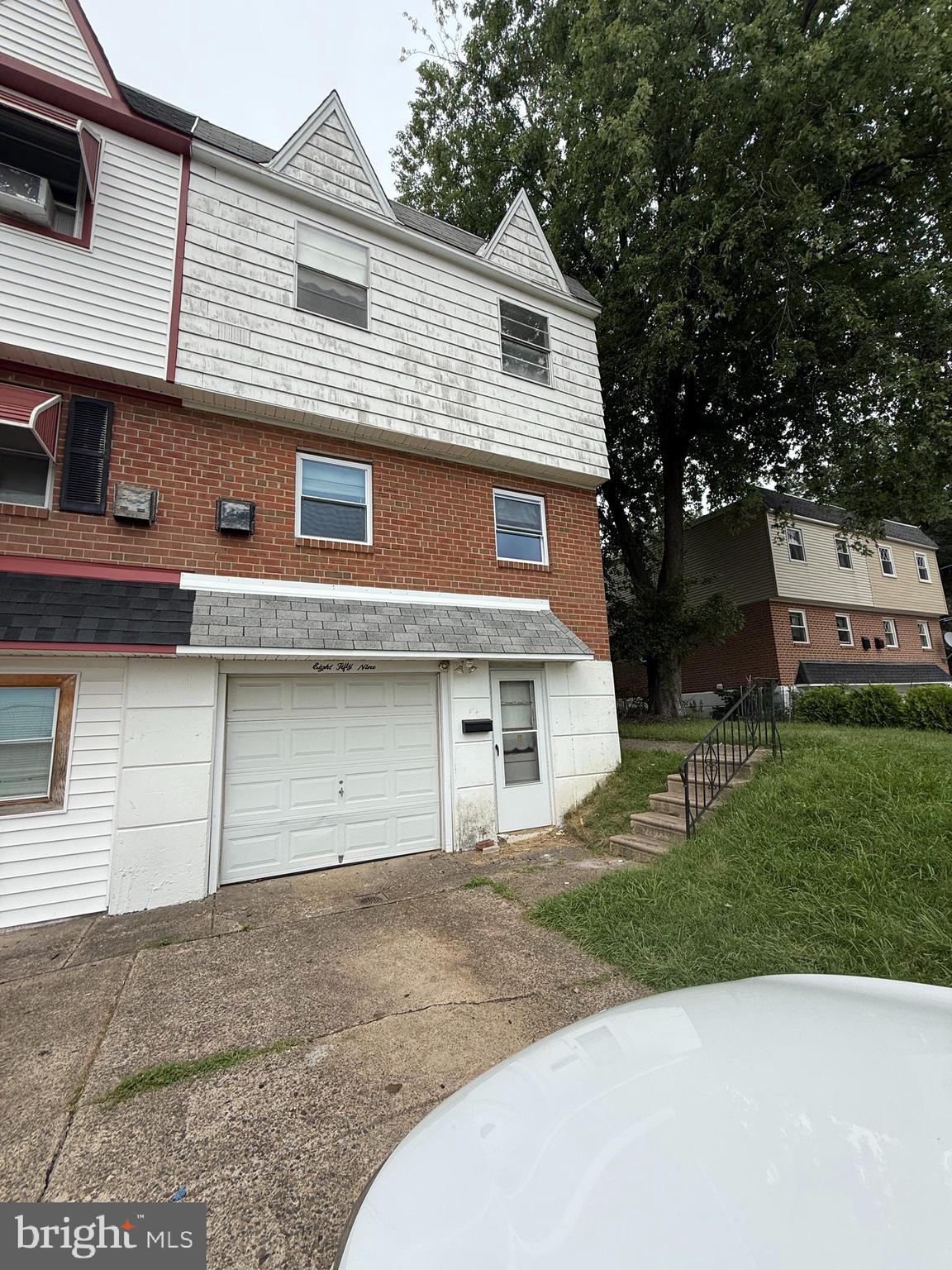 Spacious 3-bedroom, 2.5-bath home located on a quiet street in the highly desirable Somerton neighborhood of Northeast Philadelphia. Features include a walkout basement, attached garage, and private driveway. Property faces a local high school with no through traffic, offering a peaceful setting. Close to public transportation, shopping, and major roadways. Home needs FULL RENOVATION but has strong potential for customization and added value. Perfect for investors or owner-occupants looking to make it their own. Cash or hard money offers. Agent has finacial