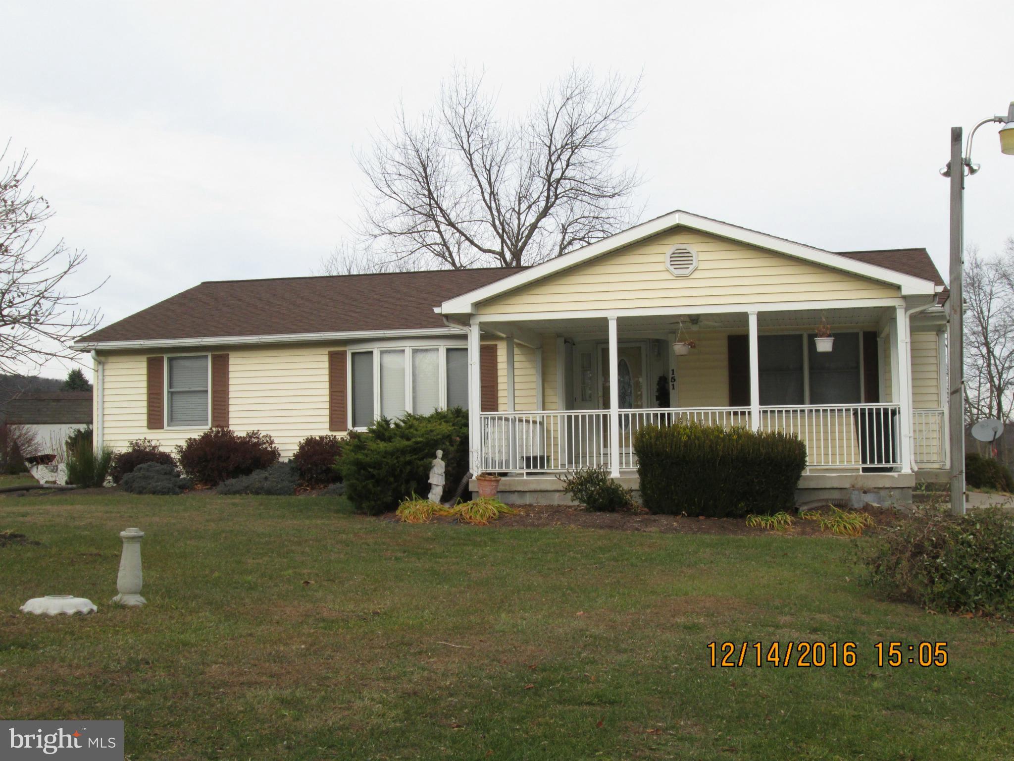 Meticulously maintained rancher on 2 cleared acres. This spacious home offers large rooms, formal living room, dining room, eat-in kitchen, large family room with pellet stove. The screened in gazebo and Trex decking are perfect for outdoor entertaining. Relax on the large, covered front porch. Lot is level and features fenced rear yard & shed. Just minutes from town, convenient for commuters!