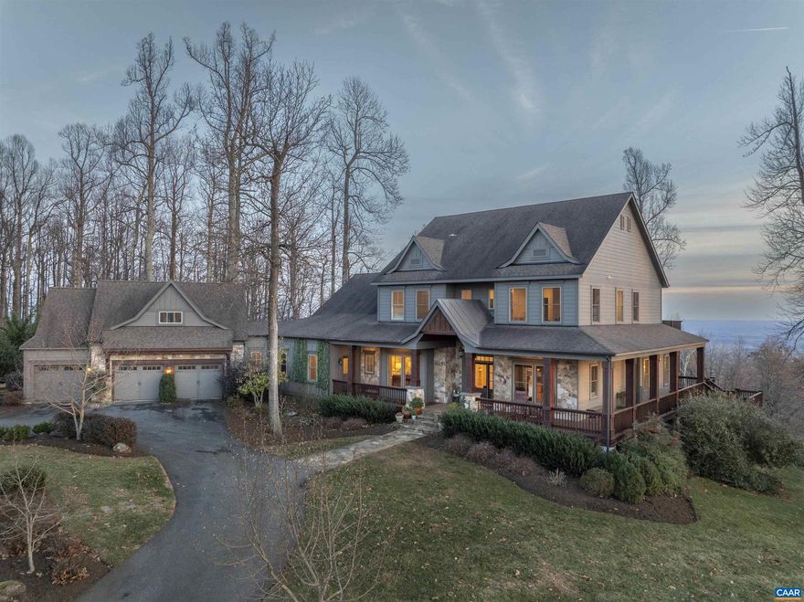 Sited on top of the Southwest Mountains with panoramic views, minutes from town, this 6 bedroom house represents the best of all worlds.  A well-built home in impeccable condition with an exceptional floor plan including a recent Karen Turner designed kitchen open to a large, sun-drenched living room with fireplace, first floor primary and bath.  A bedroom suite over the large, attached garage is perfect for guests, au pair or in-laws.  Three spacious bedrooms, two baths, second washer/dryer and study area on second level. The lower level boasts a large family room which open out to a stone patio with outdoor fireplace. Wrap around decks allow you to take in views from every direction, from the year-round 50-mile ?Jefferson Sea? view to the South to 180 degree seasonal views of sunrises and sunsets over Charlottesville and the Blue Ridge Mountains to the West. Tranquility and views, right on Charlottesville?s doorstep.,Marble Counter,Wood Cabinets,Fireplace in Family Room,Fireplace in Living Room