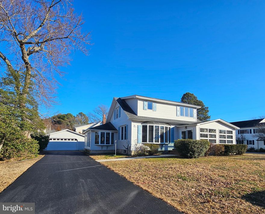 Charming Cape Cod on a corner lot in the heart of Oxford, Maryland’s Eastern Shore. This 3-bedroom, 1.5-bath home at 807 South Morris Street offers glimpses of the Tred Avon River from multiple rooms. Walk across the street to enjoy sunsets, sandy beach views, and peaceful water scenes from a nearby bench. The home features formal and informal living areas on the first floor, a spacious laundry room, half bath, and basement access. Upstairs are three generously sized, freshly carpeted bedrooms and a full bath. A paved driveway leads to a detached two-car garage with ample space for vehicles and toys. A wonderful opportunity to enjoy small-town living with water just steps away.