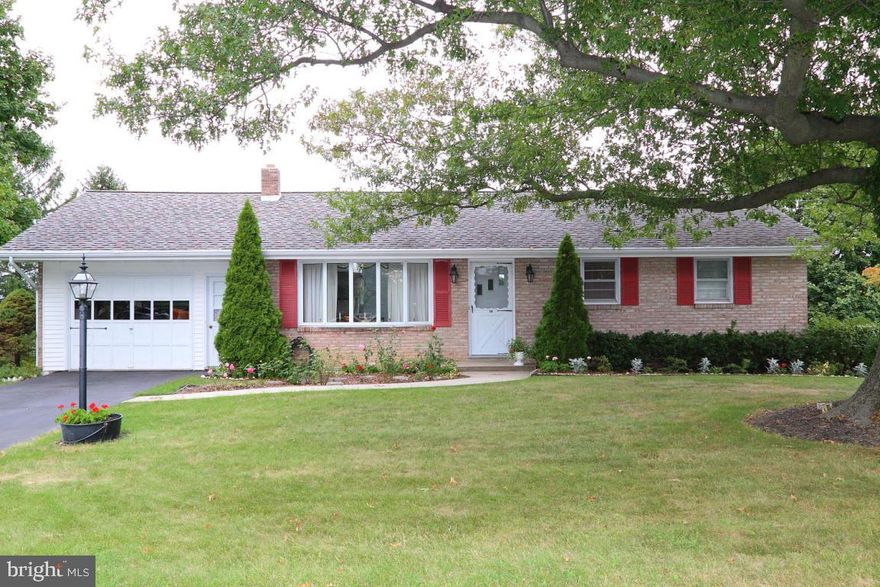 Spacious all brick Ranch home w-a fantastic view overlooking farmland. Lots of space, hardwood floors thru-out. Newer 4 zone furnace, sun room, LL family room, plus rec room w-tons of built-in storage, workshop too, and office. Great patio area. Really need to take a look!