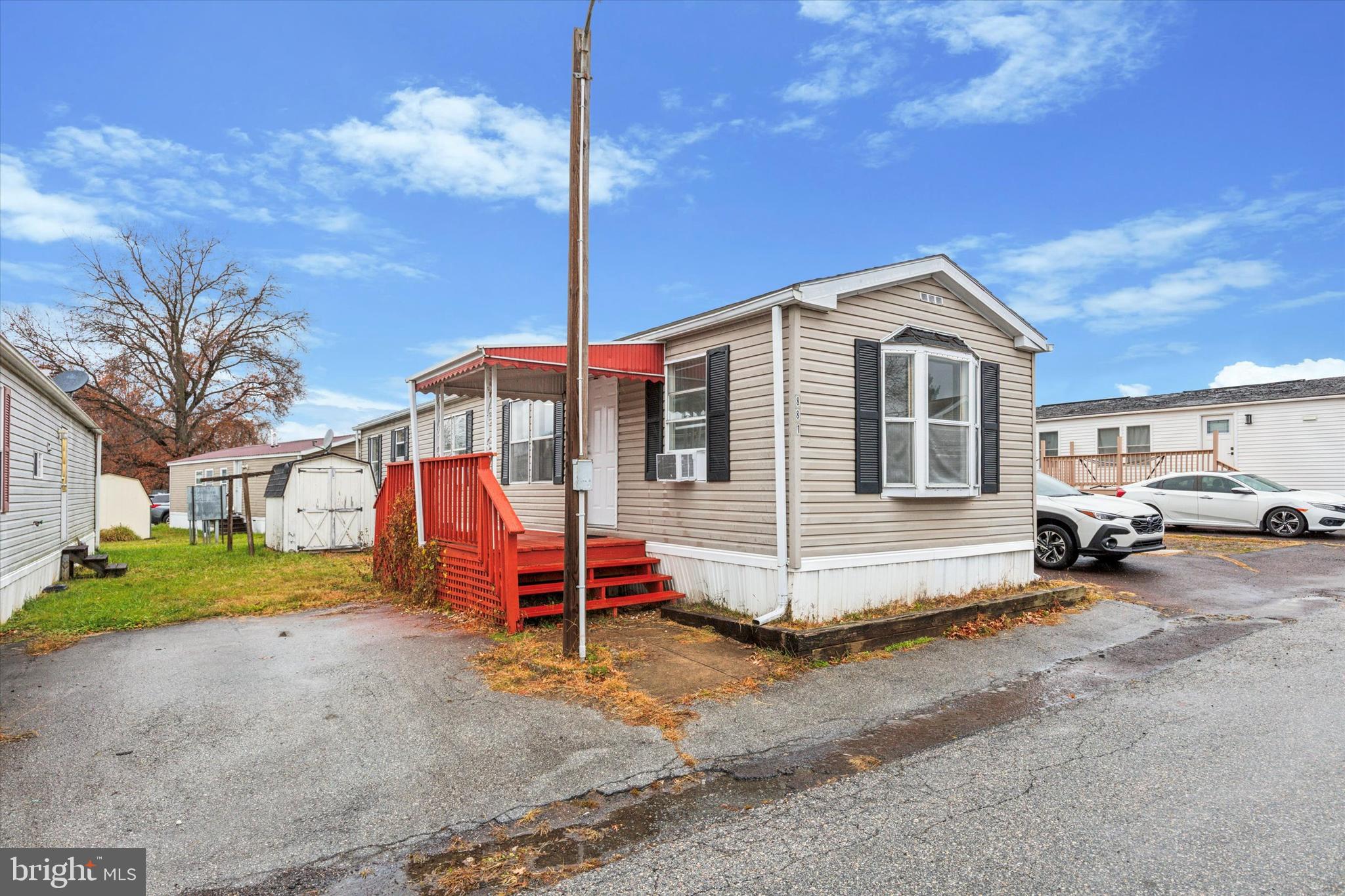 Welcome to this charming 2 bedroom, 1-bath manufactured home in the desirable Spring City Community! Perfectly designed for easy living, this home offers a bright and spacious layout, featuring an open-concept living area that flows into a well-equipped kitchen with a countertop, built-in microwave, and plenty of cabinet space. The sale includes a washer and dryer (as-is), making this home move-in ready. Outside, you'll find two convenient off-street parking spaces, making it easy to come and go. The lot rent is 825. The lot rent includes water, trash, and sewage—providing you with a worry-free lifestyle. Make your appointment today!