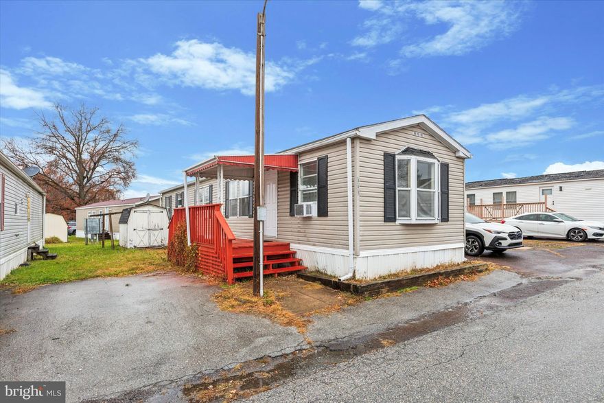 Welcome to this charming 2 bedroom, 1-bath manufactured home in the desirable Spring City Community! Perfectly designed for easy living, this home offers a bright and spacious layout, featuring an open-concept living area that flows into a well-equipped kitchen with a countertop, built-in microwave, and plenty of cabinet space. The sale includes a washer and dryer (as-is), making this home move-in ready. Outside, you'll find two convenient off-street parking spaces, making it easy to come and go. The lot rent is 825.  The lot rent includes water, trash, and sewage—providing you with a worry-free lifestyle. Make your appointment today!