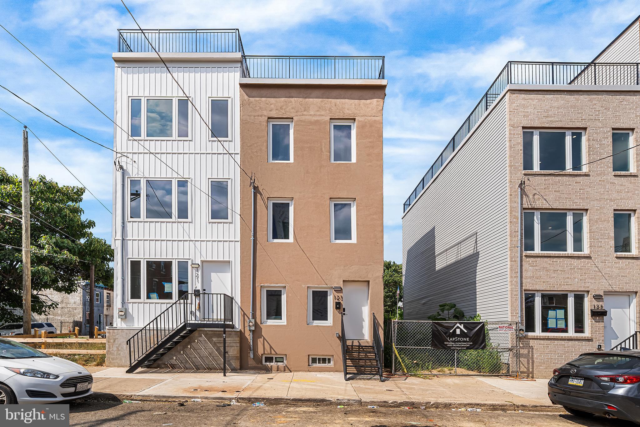 Welcome to 123 E Cumberland, a stunning brand-new renovated 4-bedroom, 2-bathroom home in Fishtown! This home offers approximately 2,000 square feet of thoughtfully designed living space, crafted with modern finishes and high attention to detail.
Step inside to an open-concept layout with sleek finishes and large windows that flood the space with natural light. The kitchen is the heart of the home, featuring stainless steel appliances, quartz countertops, a stylish tile backsplash, and contemporary cabinetry.
Upstairs, you’ll find 4 spacious bedrooms with generous closet space and a full bathroom with quality finishes.
The fully finished basement adds another level of living space, ideal for a home office, gym, playroom, or media room, with plenty of room for storage.
The highlight of this property is the full rooftop deck, perfect for entertaining and enjoying stunning skyline views. Plus, this home comes with a 1-year builder warranty.