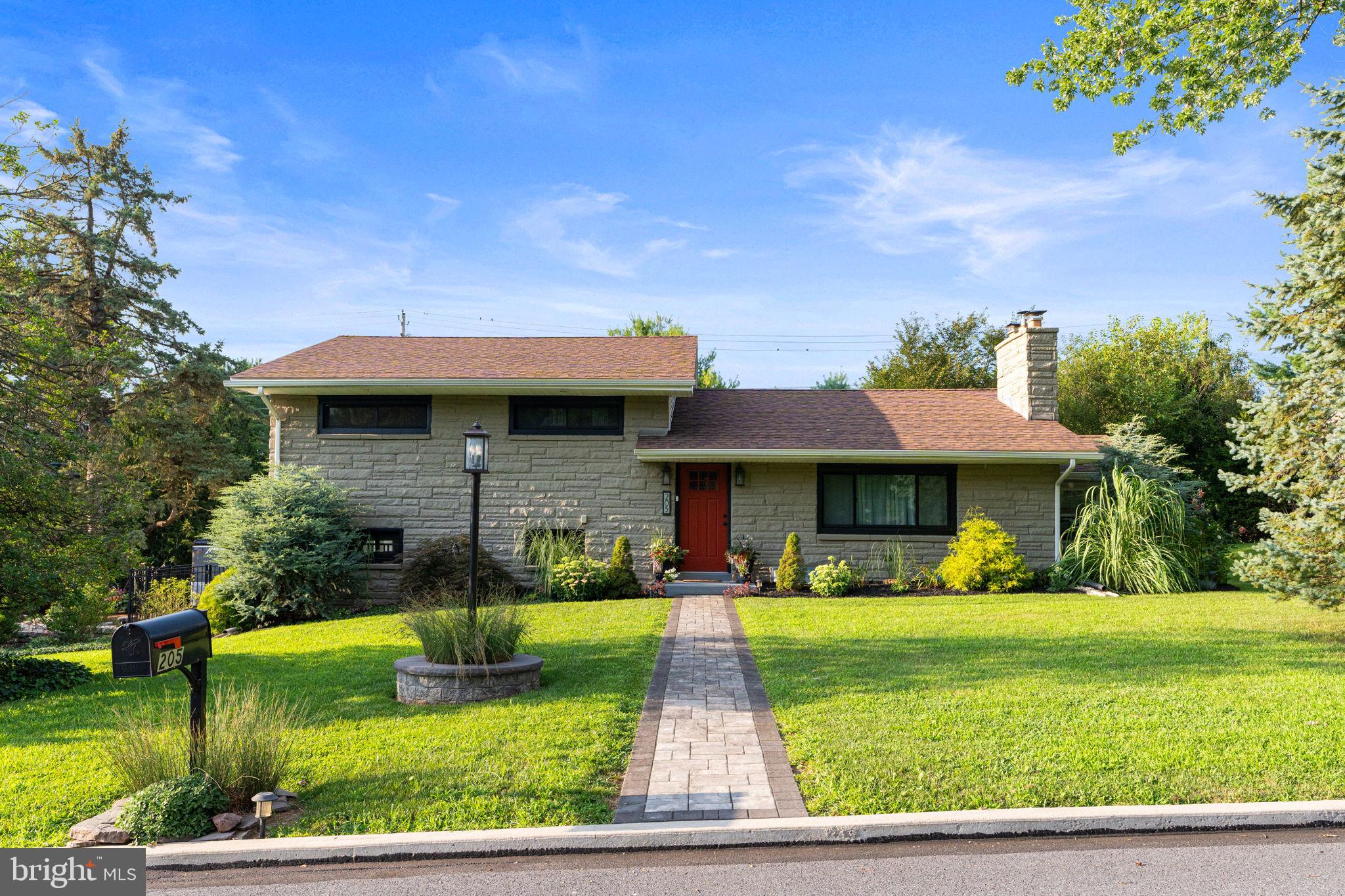Experience the best of Hershey living! Enjoy the perfect balance of convenience and charm in this beautifully updated home, ideally situated on a corner lot with a large fenced backyard. Located just minutes from downtown Hershey’s shops and restaurants, yet tucked into a peaceful neighborhood, this home offers the best of both worlds. The mid-century modern exterior retains its original character, while the interior has been thoughtfully upgraded with all the modern comforts including all new custom windows. Step through the front door into an open-concept main level featuring a stunning, renovated kitchen, inviting dining area, and a cozy living room complete with a fireplace. A bright four-season sunroom extends off the main living space, offering a serene spot to unwind with a book or sip your morning coffee. In the warmer months, enjoy outdoor entertaining on the beautifully designed stone patio, complete with a built-in fire ring—perfect for summer evenings under the stars. Upstairs, you’ll find a spacious primary suite, two additional bedrooms, and a full bath. The versatile lower level adds even more living space, including a bathroom, laundry room, and two flexible rooms that can serve as a home gym, playroom, or guest quarters. This home is full of possibilities—don’t miss your chance to make it yours! New roof (2018), New Garage Doors (2019), Basement Waterproofed (2019), New 54' Fence (2019), New Stone Retaining Wall (2020), Upper & Lower Patios w/Gravel Pad (2021), Shed (2021), Front Walkway/hardscaping (2022), Custom Windows (2022), and so much more! See attached list of all the upgrades.