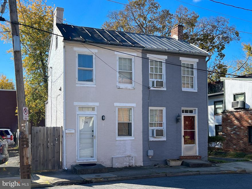 Superb location for this circa 1900 row house in downtown Frederick just minutes from restaurants, breweries, Hood College, Baker Park, Frederick Hospital and so much more! With a little creativity you can make this home a showplace. The second room upstairs would be ideal for a nursery, office or home gym. Features include exposed brick walls, wood floors, updated bath, updated electric and parking for 2 cars behind the house. Use driveway to get to back of house.