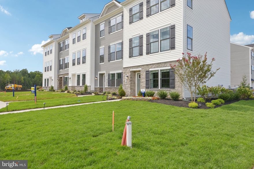 Introducing the Norris townhome by D.R. Horton, a fresh take on townhome living designed to elevate your Lifestyle with 3 bedrooms 2.5 bathrooms and a 2 car garage. This 1763 sq. ft. townhome is an entertainers dream. Featuring an open-concept living room and kitchen complete with upgraded appliances, elegant countertops and a chic eat in island. This space is perfect for hosting gatherings and creating memorable moments. On the second floor the spacious primary bedroom provides a serene retreat, boasting a luxurious en suite with dual vanities and generous walk in closet. The upstairs laundry near the secondary bedrooms offers practicality. Embrace the future with D.R. Horton's smart home technology package, allowing you to effortlessly control and monitor your home from anywhere, whether you're unwinding at home or off on your next adventure. Take advantage of generous closing assistance, making this townhome the ultimate choice for modern living that's both practical and luxurious. Elevate your lifestyle with the Norris townhome - the epitome of contemporary living awaits.