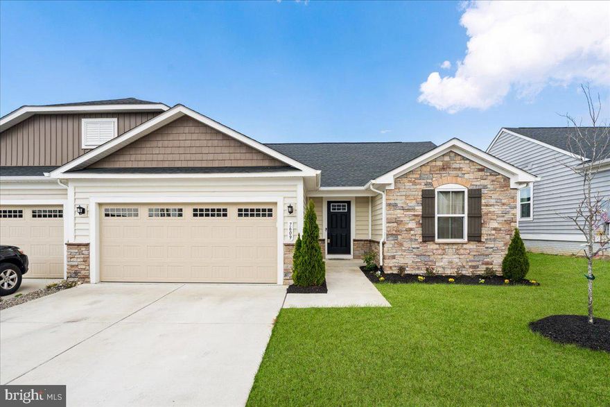 Welcome to refined, low-maintenance living in the highly desirable Villas at Keswick, a premier 55+ community in Spotsylvania. Built in 2021, this beautifully designed one-level home with a fully finished basement offers over 2,700 square feet of thoughtfully crafted living space, combining comfort, flexibility, and modern style.

The main level features an open-concept layout with luxury flooring, abundant natural light, and a spacious kitchen complete with stainless steel appliances, ample cabinetry, and a large center island—perfect for entertaining or everyday living. The adjoining dining area and family room create a seamless flow, while the primary suite offers a private retreat with a well-appointed en-suite bath and generous walk-in closet. Additional main-level bedrooms provide versatility for guests or a home office.

The finished basement significantly expands your living space with a large recreation room, private bedroom, full bath, and a beautifully finished kitchenette—ideal for extended stays, entertaining, or multi-generational living.

Enjoy outdoor living on the low-maintenance composite deck overlooking a fully fenced backyard with vinyl privacy fencing—perfect for relaxing or hosting gatherings.

Additional highlights include a 2-car attached garage, energy-efficient construction, and access to community amenities designed for active adult living. Conveniently located near shopping, dining, medical facilities, and commuter routes, this home offers the perfect blend of ease, space, and lifestyle.