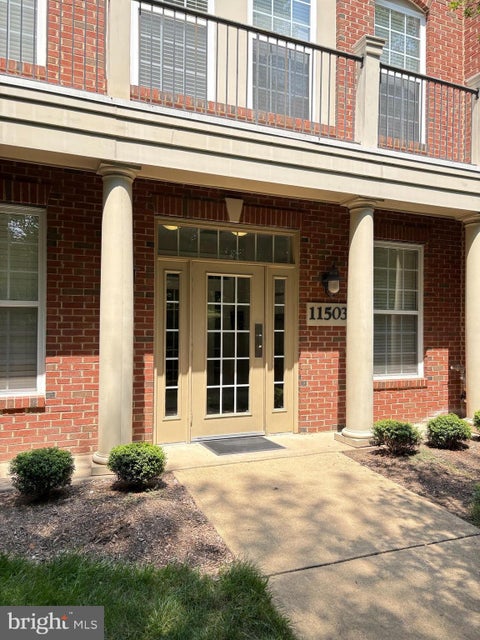 Photo of 11503 Sperrin Circle #302, FAIRFAX, VA 22030 (MLS # VAFX2334816)