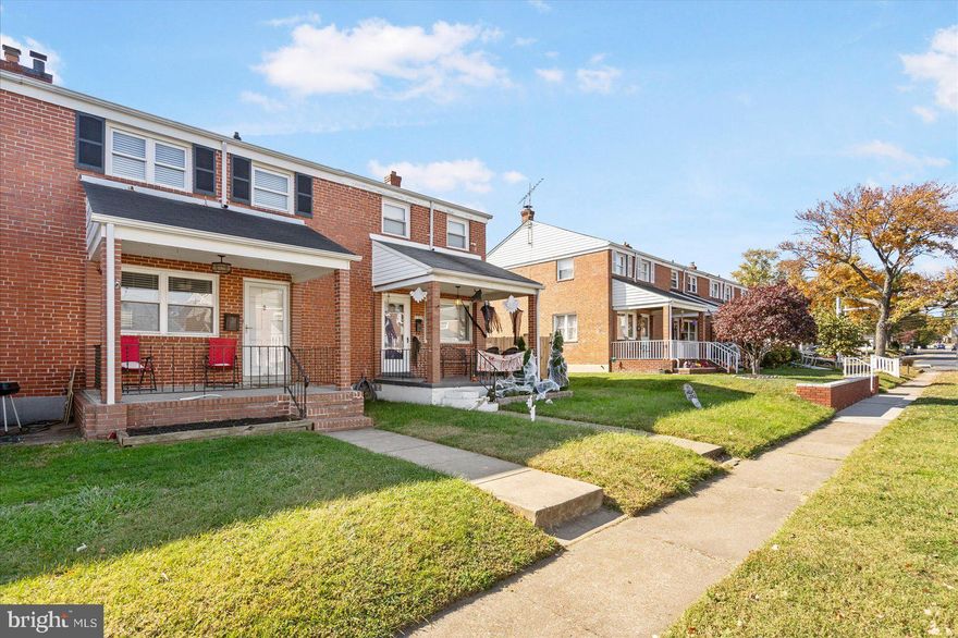 Beautifully updated 3BR/1.5BA brick townhome located in the Stansbury neighborhood!  Walk past a well maintained front yard on your way to the covered front porch of your forever home.  Open the door and step inside to a bright open floor plan with a soft color pallet, luxury flooring, and tons of natural light.  The main floor offers a large living room with an arched entry into the spacious dining room and kitchen.  The kitchen offers plenty of wood cabinets and counter space, a tiled backsplash, black and stainless appliances, a stainless sink, and a peninsula between the dining room and kitchen ideal when hosting family and friends. Original hardwood floors begin from the staircase leading to the second floor boasting a spacious primary bedroom, two sizable secondary bedrooms, and a full bath.  The lower level offers additional living space featuring a carpeted large family room with a wall of built-in shelving, a half bath, laundry, storage and a walk-out to the fenced yard.  From the main floor step outside to a covered deck in the well maintained yard offering green space and a large parking pad for off street parking.  This home is move-in ready with so much to offer new homeowners and is located in close proximity to shopping, restaurants, and commuter routes.